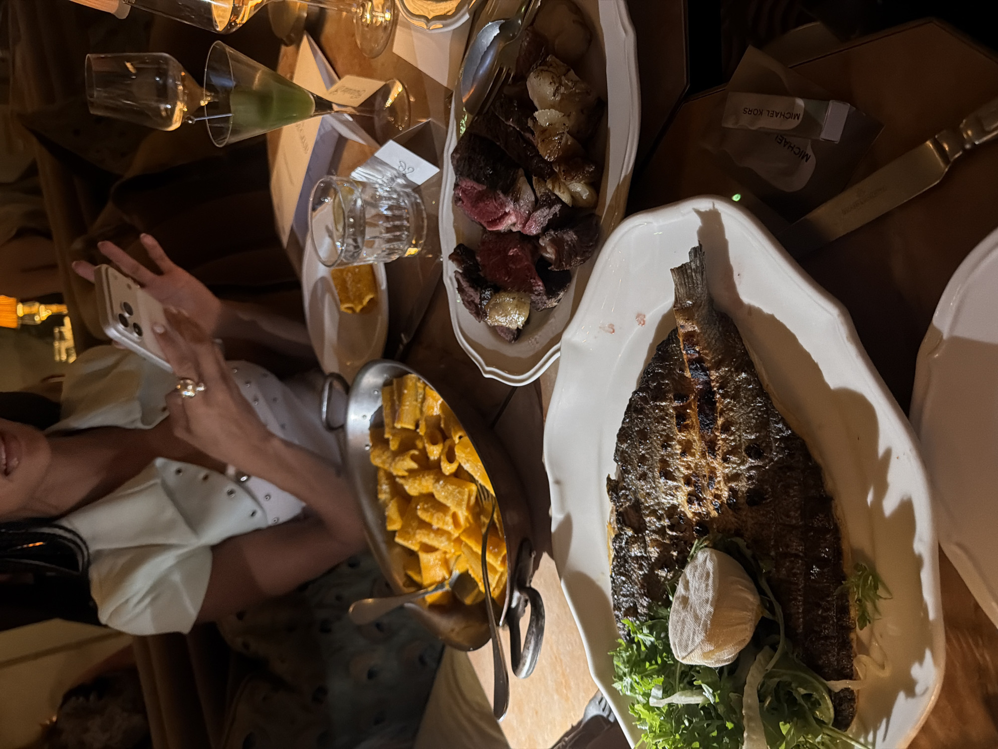 Dinner spread at a dimly lit London restaurant