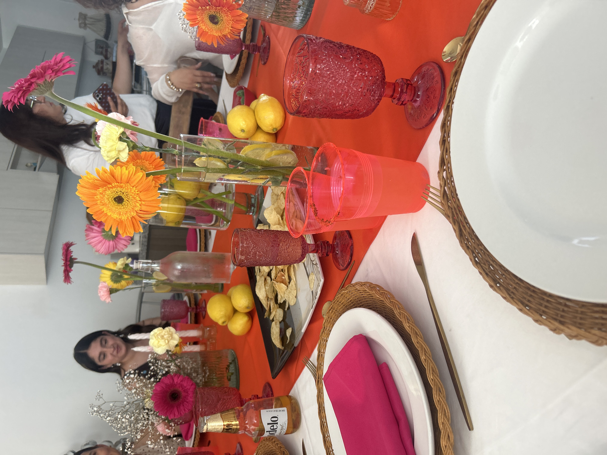Table decorated with flowers for gathering in Mexican town