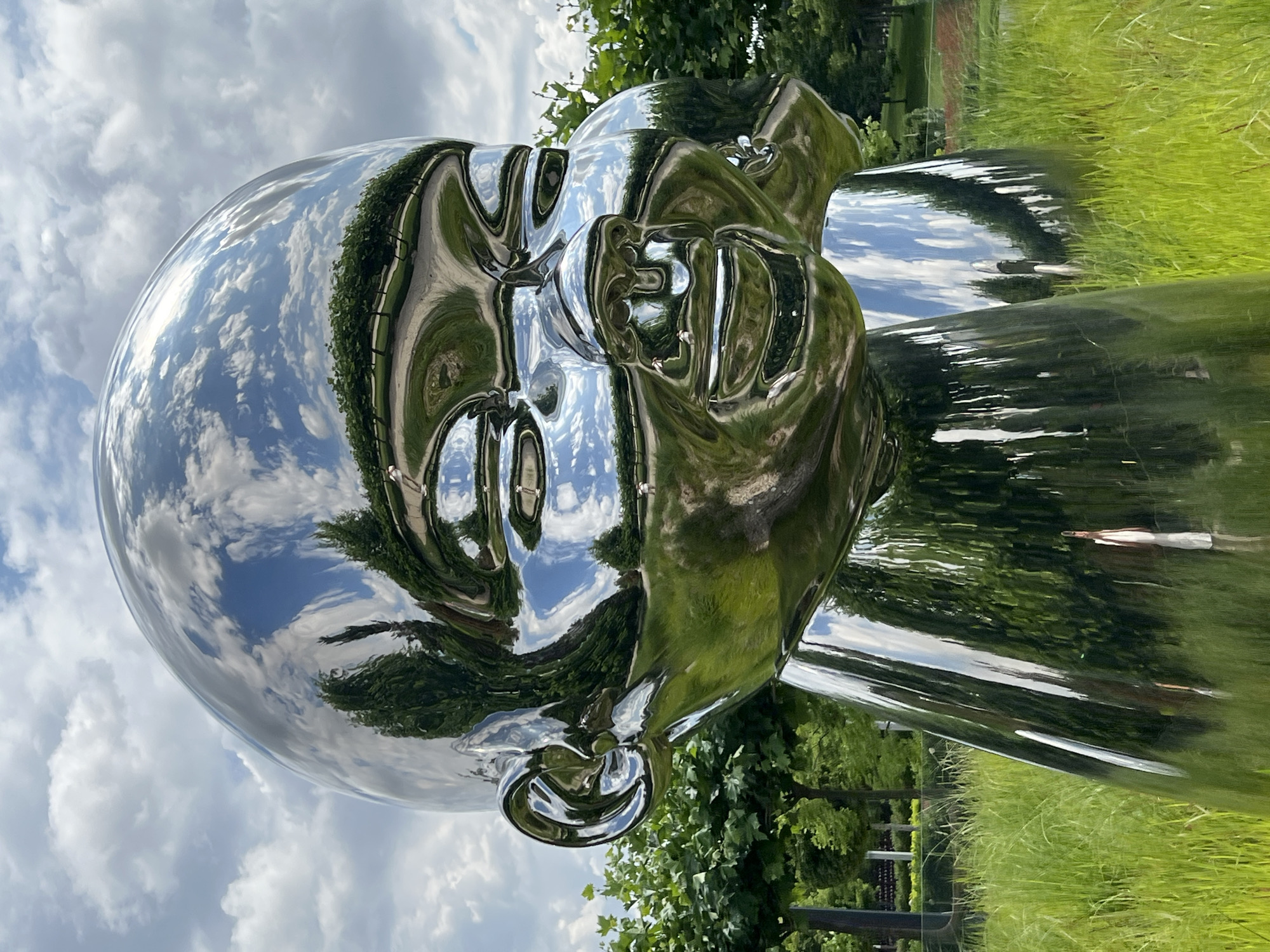 Chrome sculptures of baby heads and figures in Krasnodar park