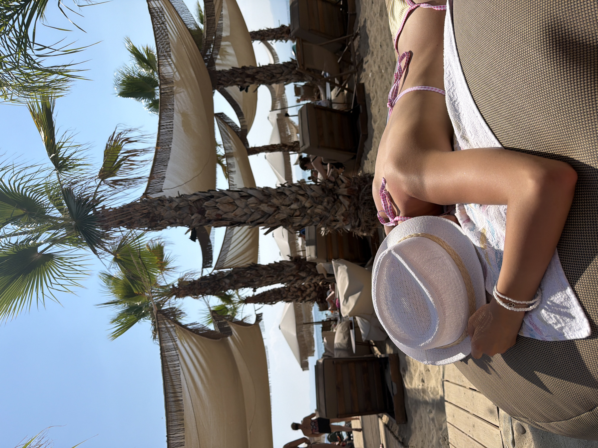 Lazy midday beach hangout at Ofrynio, Greece.