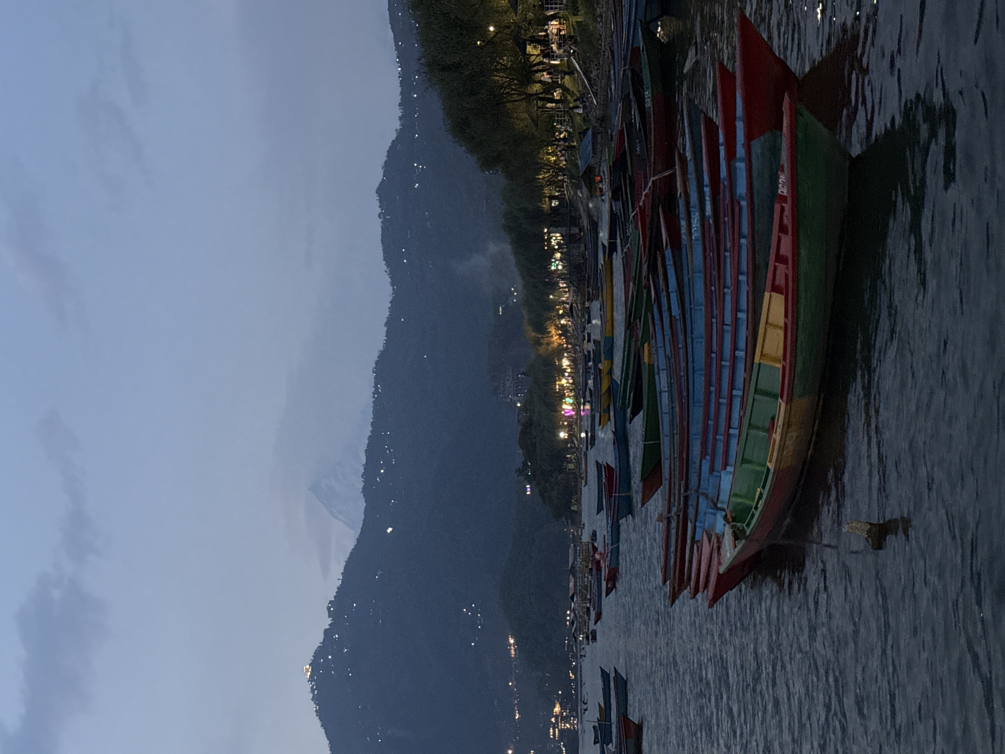 Dusk scenes captured at Phewa Lake, Pokhara with colorful boats