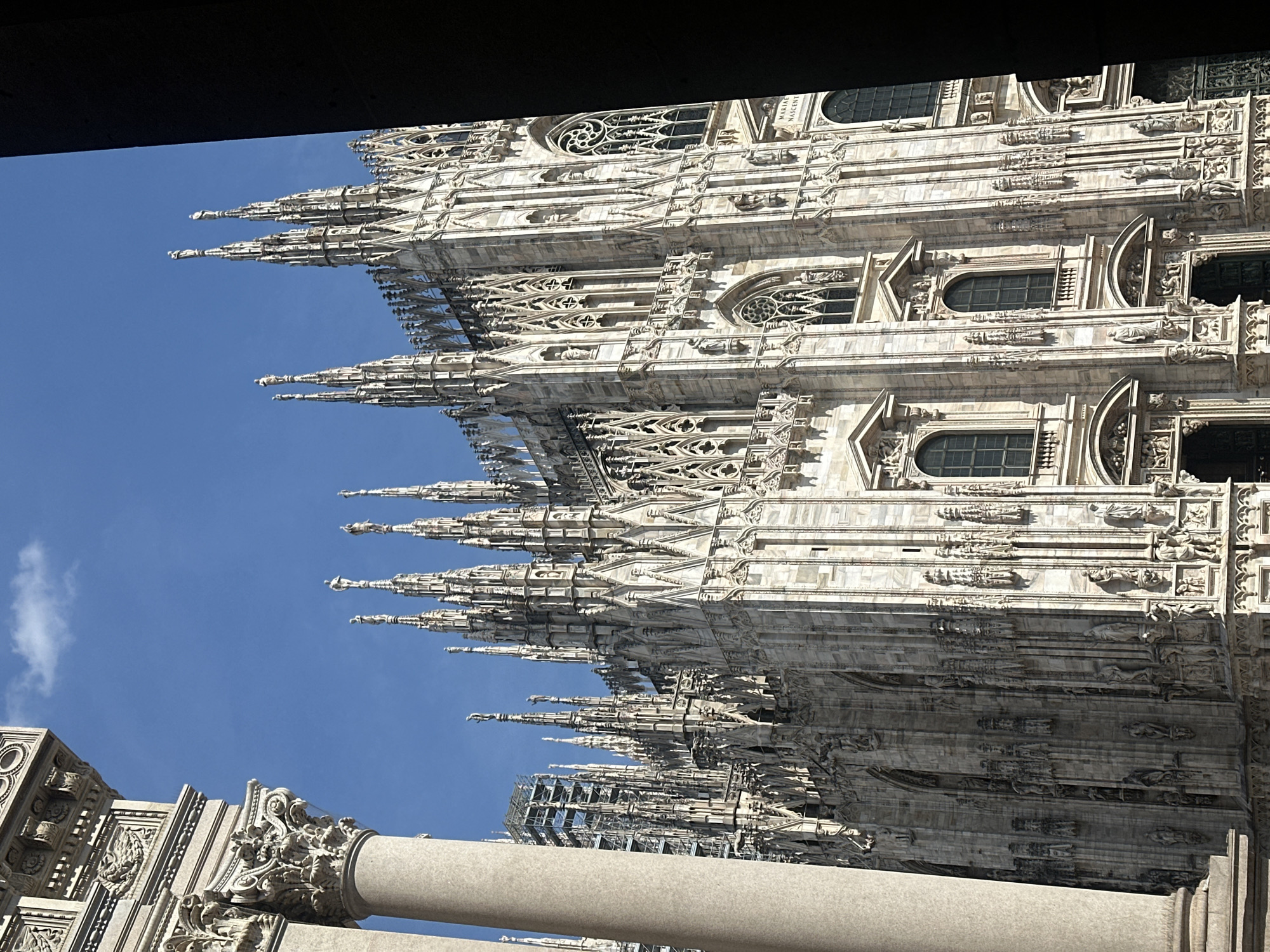 Tourist documents Milan cathedral and historic gallery visit
