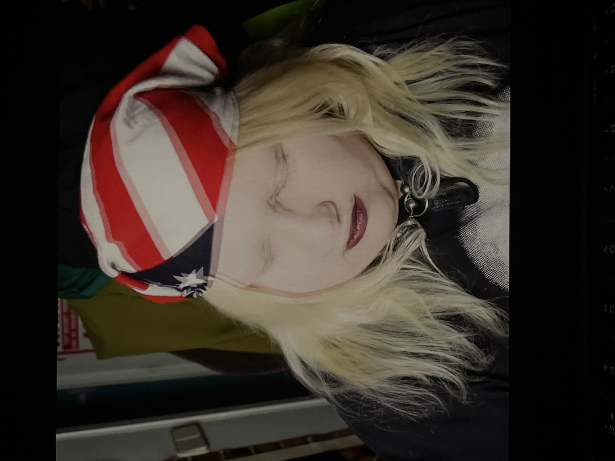 Portrait of blonde person displayed on laptop in Torrent
