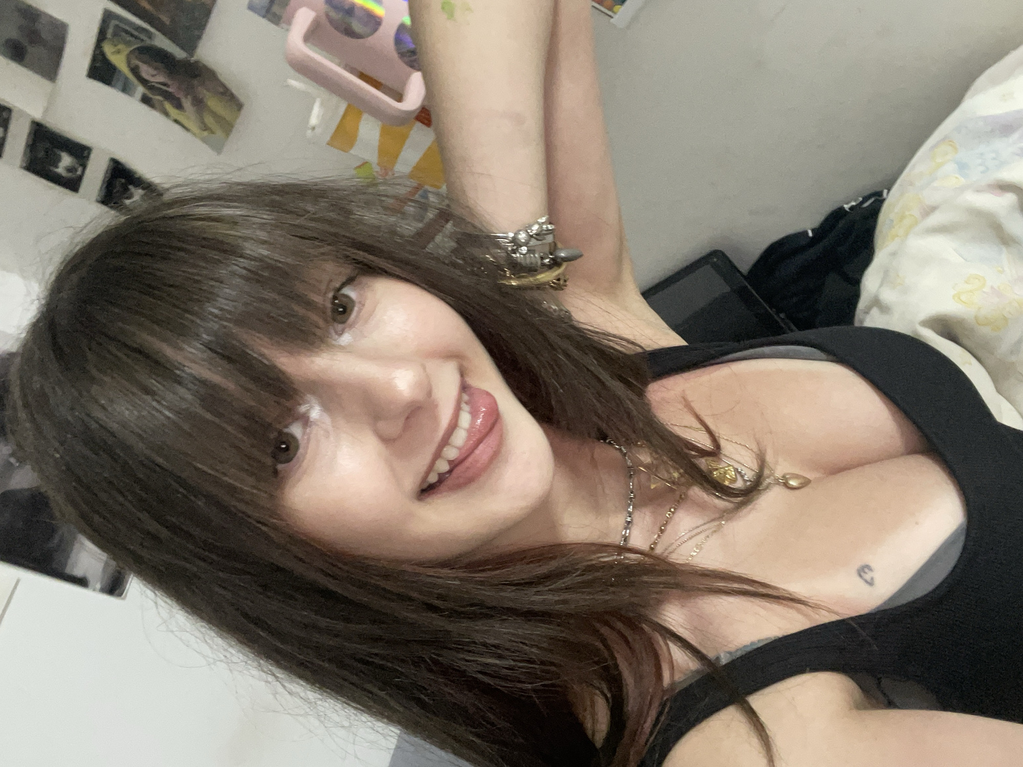 Woman takes playful selfies across multiple locations in Raanana