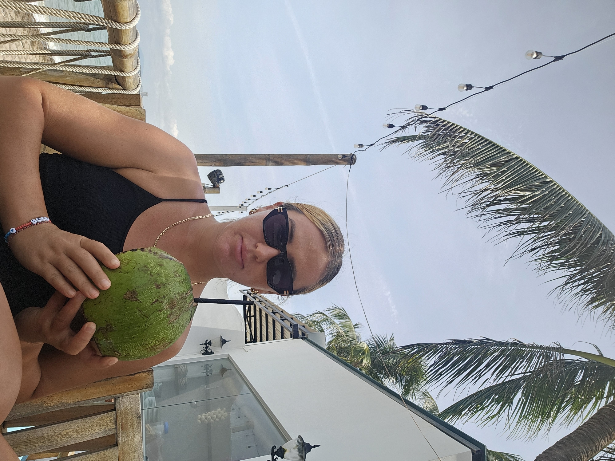 Coconut drink break at an outdoor spot in Phu Thuy Ward
