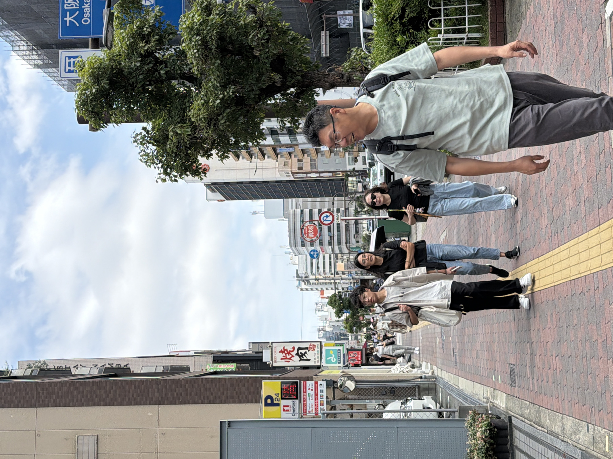 Witness documents everyday Osaka street scenes across multiple districts