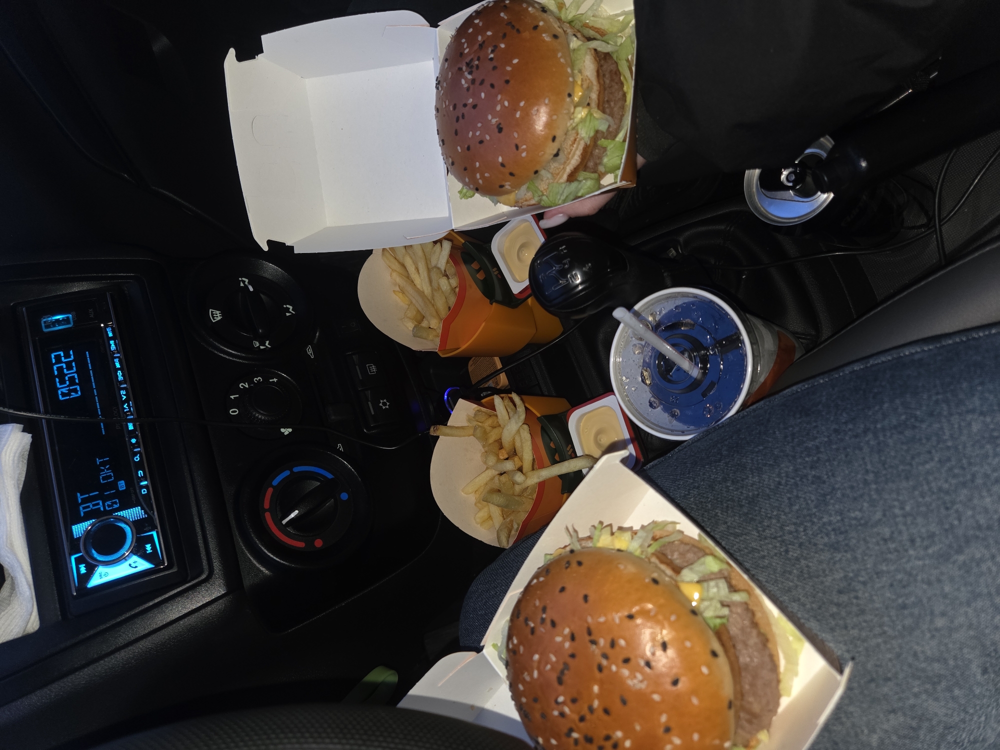 McDonald's meal documented in car interior, Perm Russia