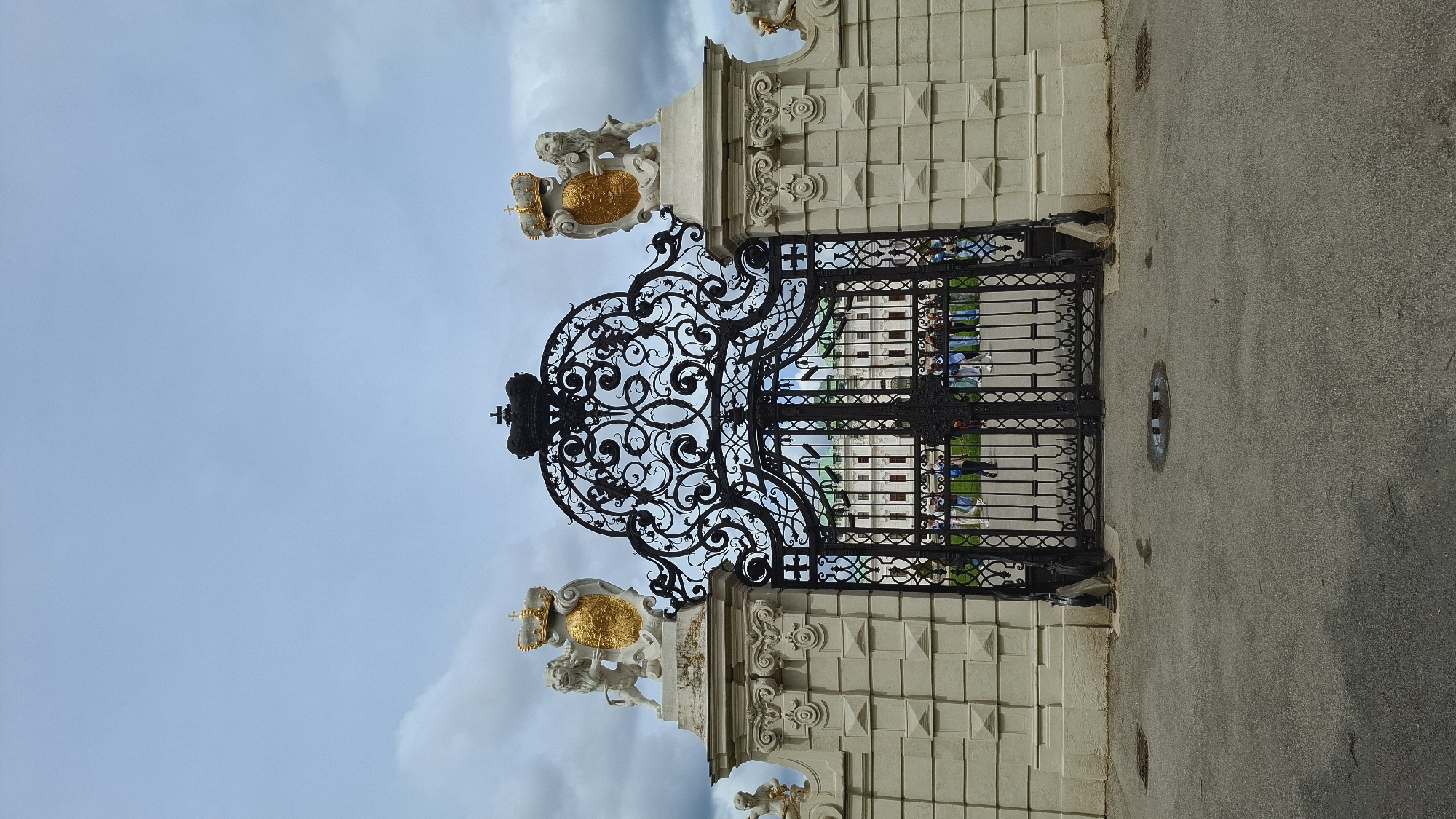 Tourist captures Vienna palace architecture during morning visit