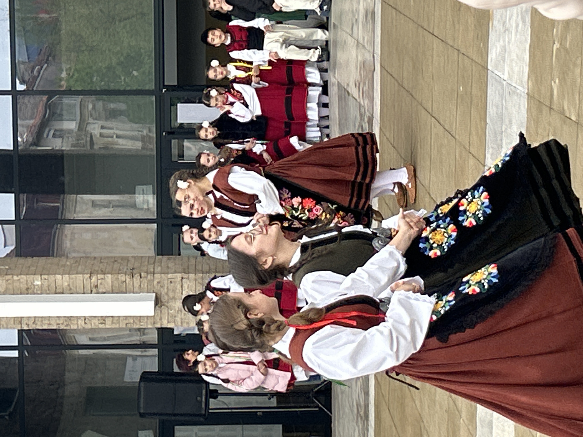 Folk dancers perform traditional Bulgarian dances outside Blagoevgrad opera house
