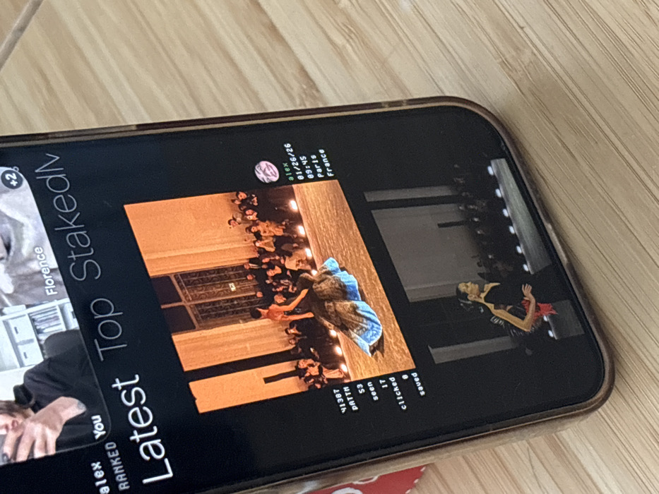 Smartphone observed on wooden surface in Tunbridge Wells