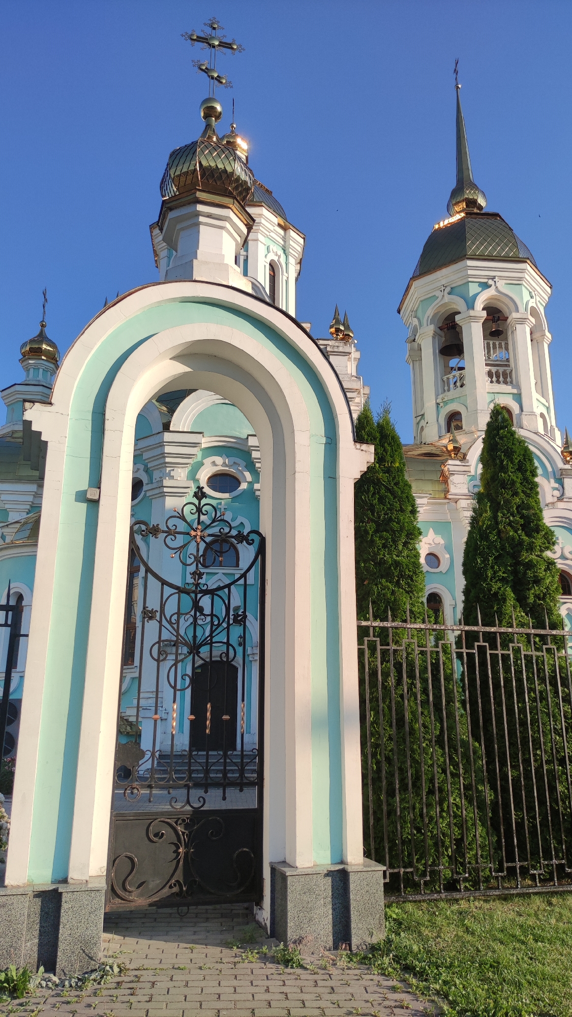 Church architecture, flowering vines, and supermarket aisles