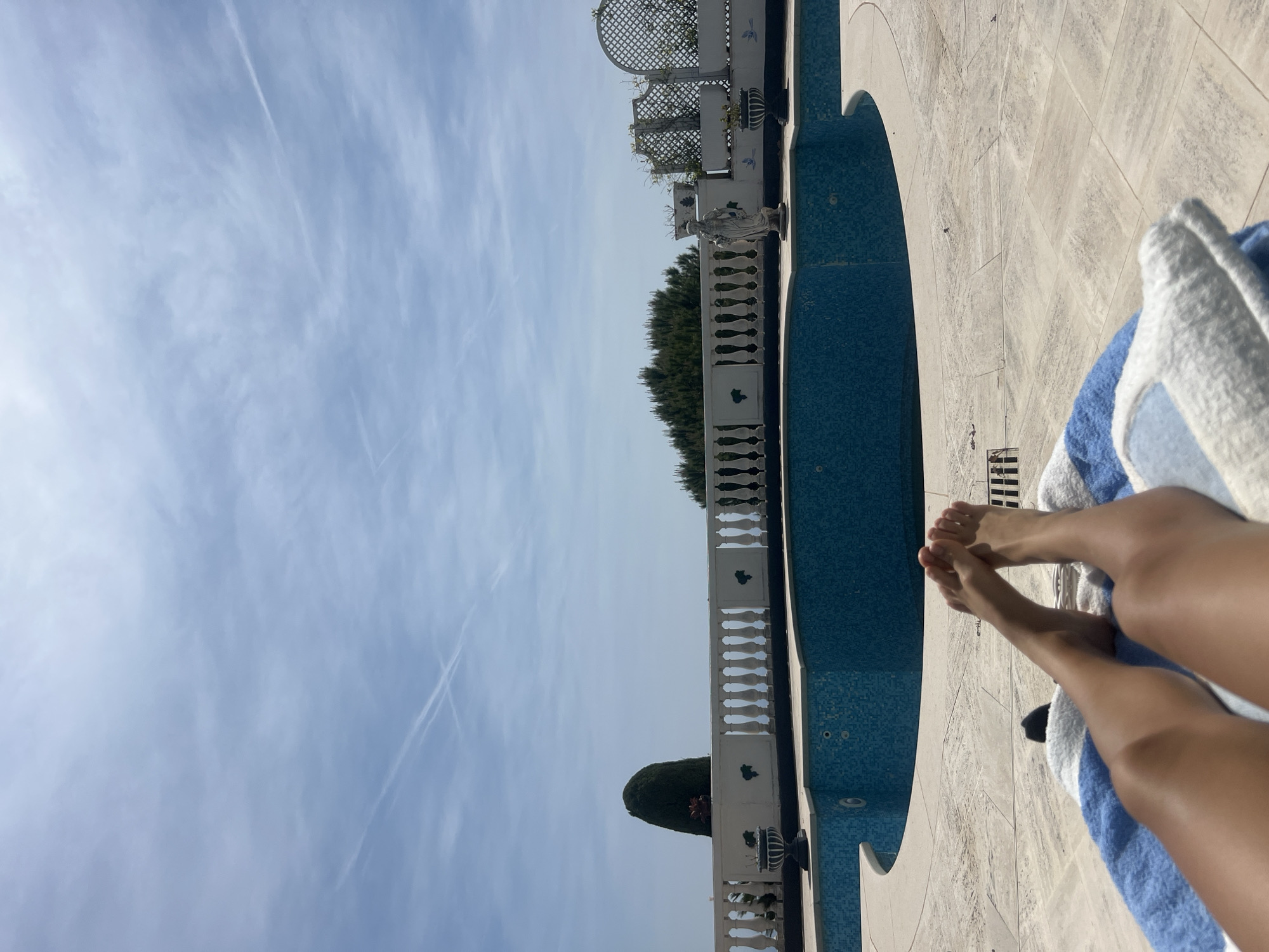 Person enjoys sunny afternoon relaxation in Èze, France