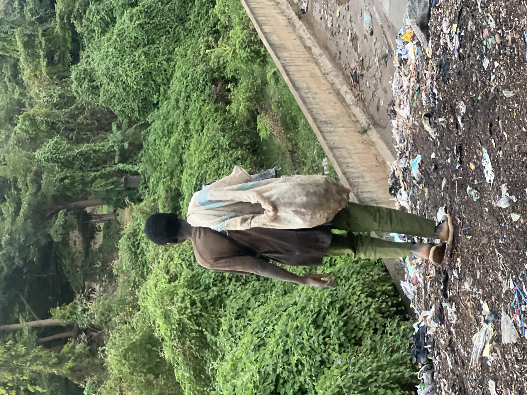 Person with bag observed at Gura Top garbage dump