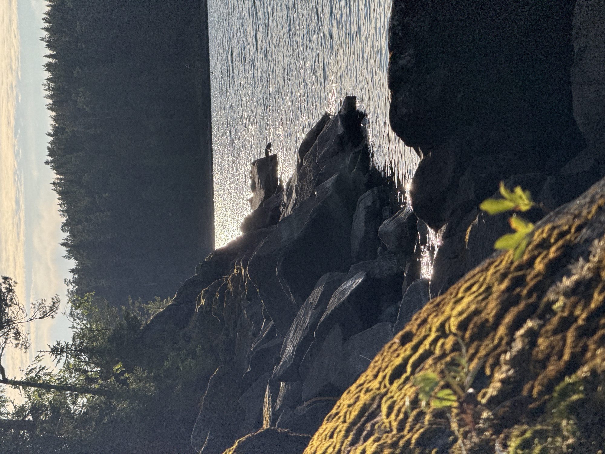 Lakeside day trip on a rocky Russian wilderness shore