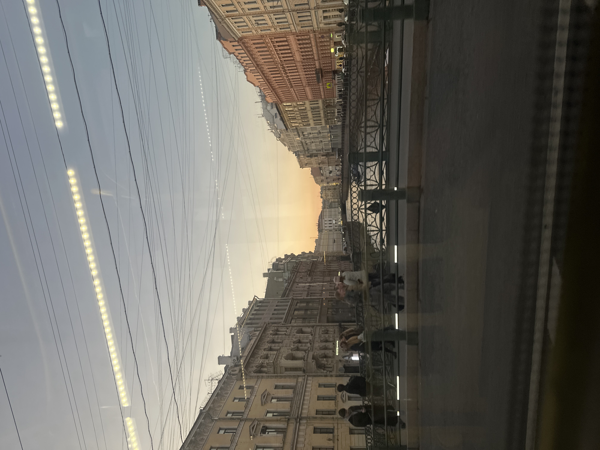 Canal view captured through window in Saint Petersburg