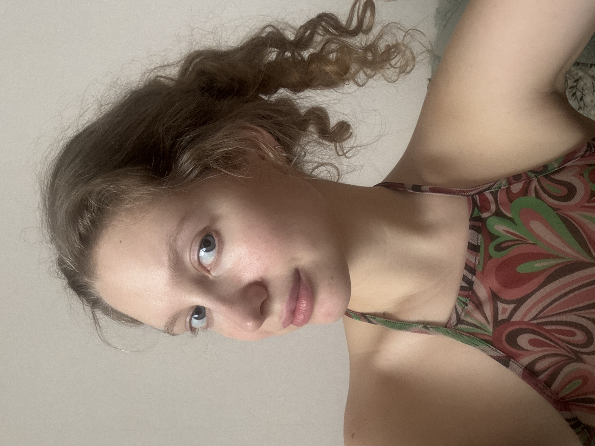 Woman takes selfies with pet budgerigars in Izhevsk apartment