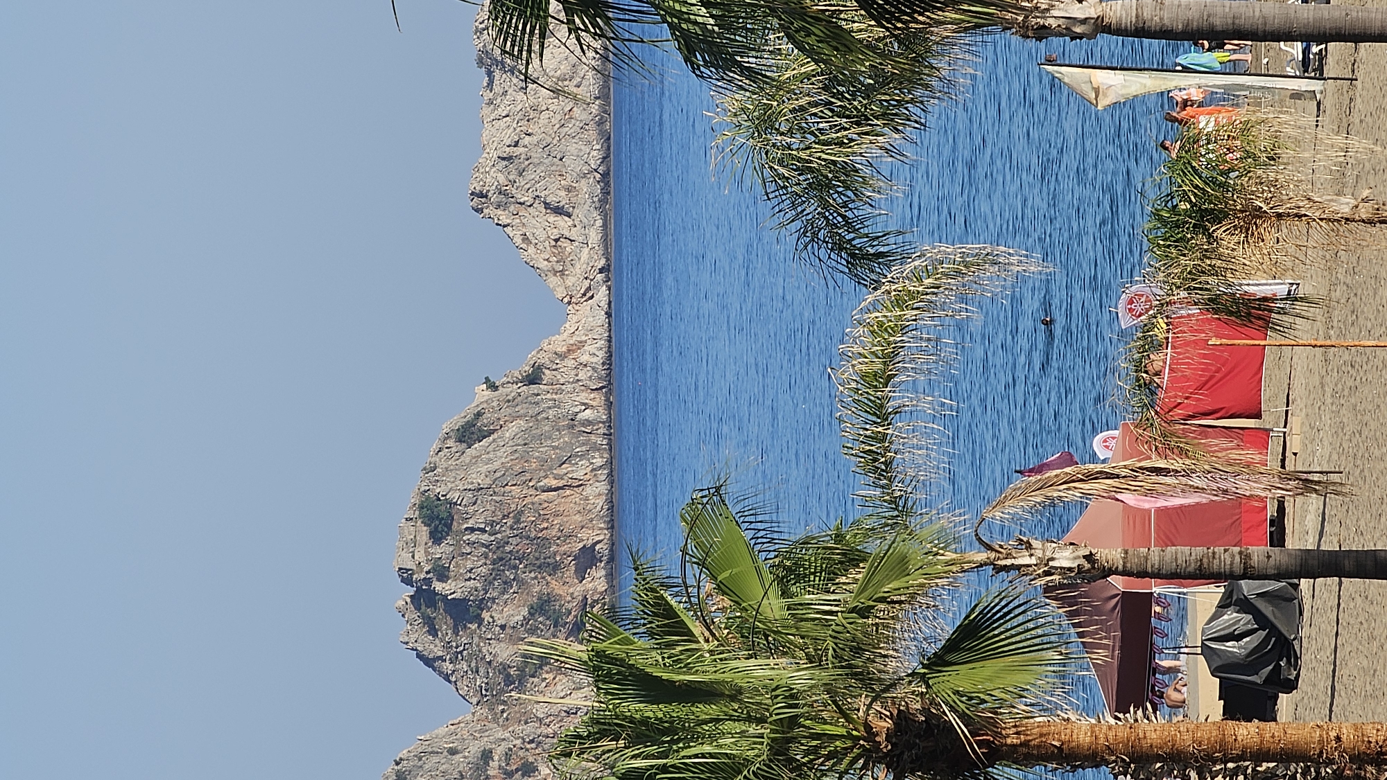 Alanya's castle coast and palm-lined streets on a sunny afternoon