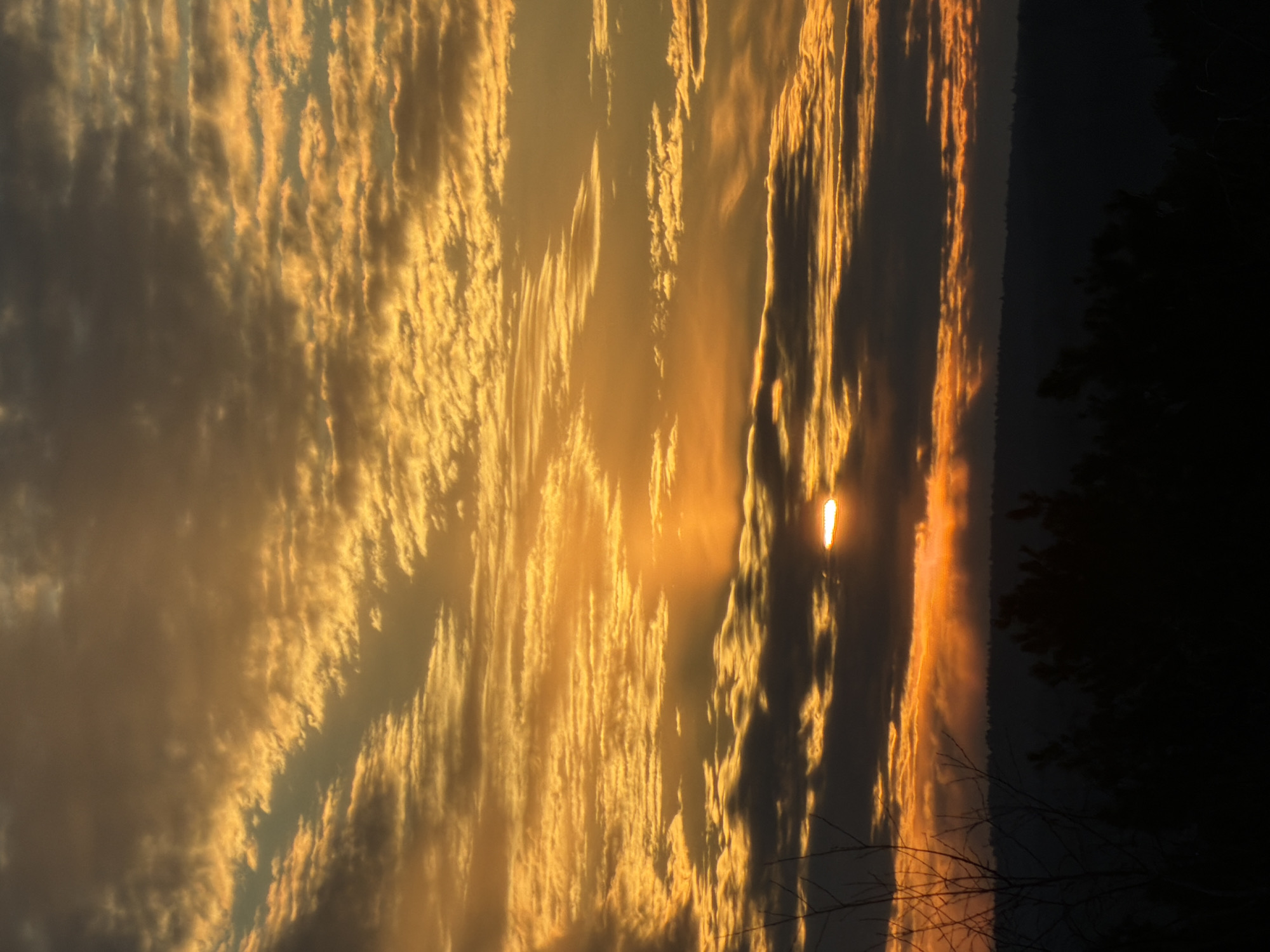 Golden sunset with clouds observed in Chaikovsky, Russia