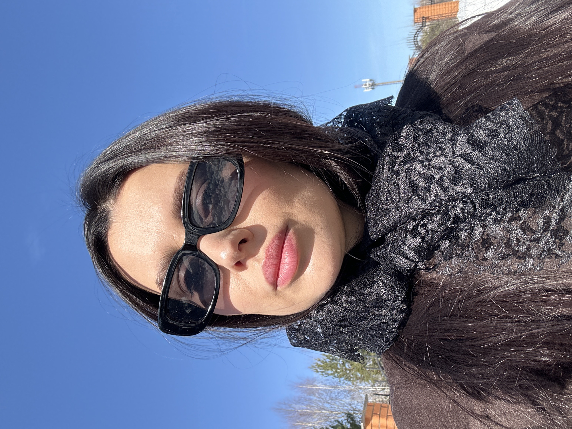 Tourist documents Orthodox churches during sunny day in Chaikovsky, Russia
