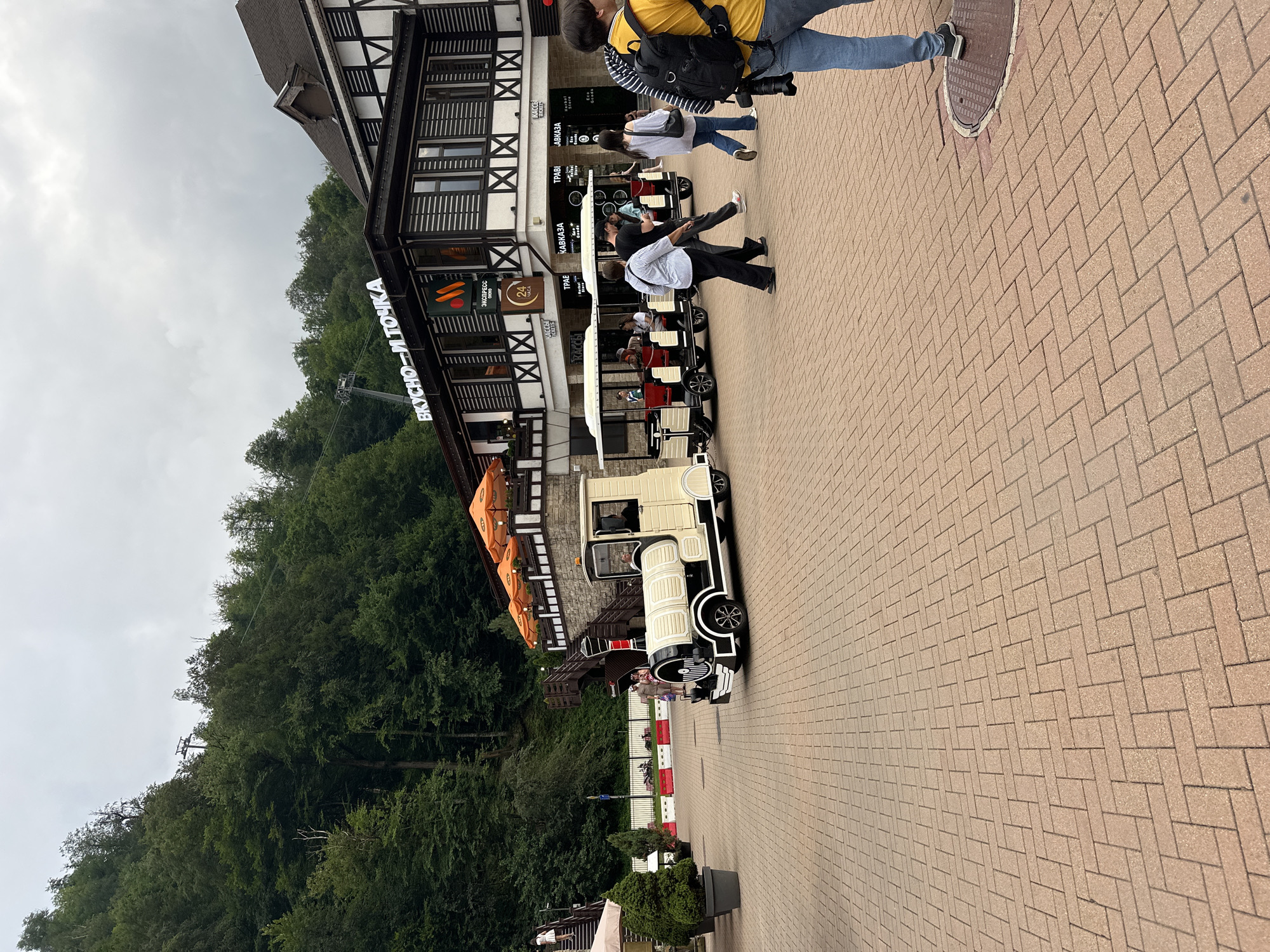 Rosa Khutor resort promenade buzzing on a summer afternoon