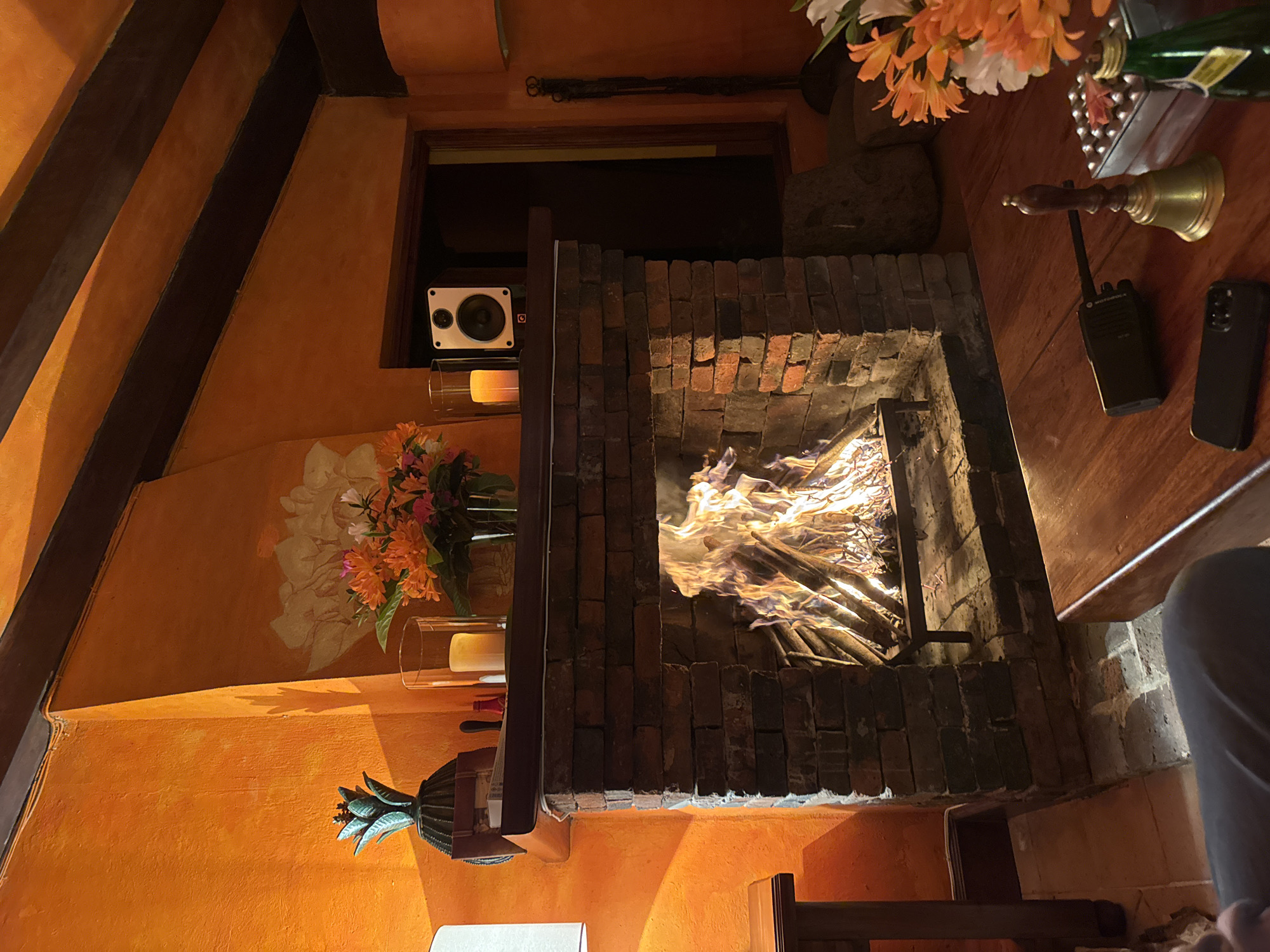 Cozy fireplace scene captured in Mexican home interior
