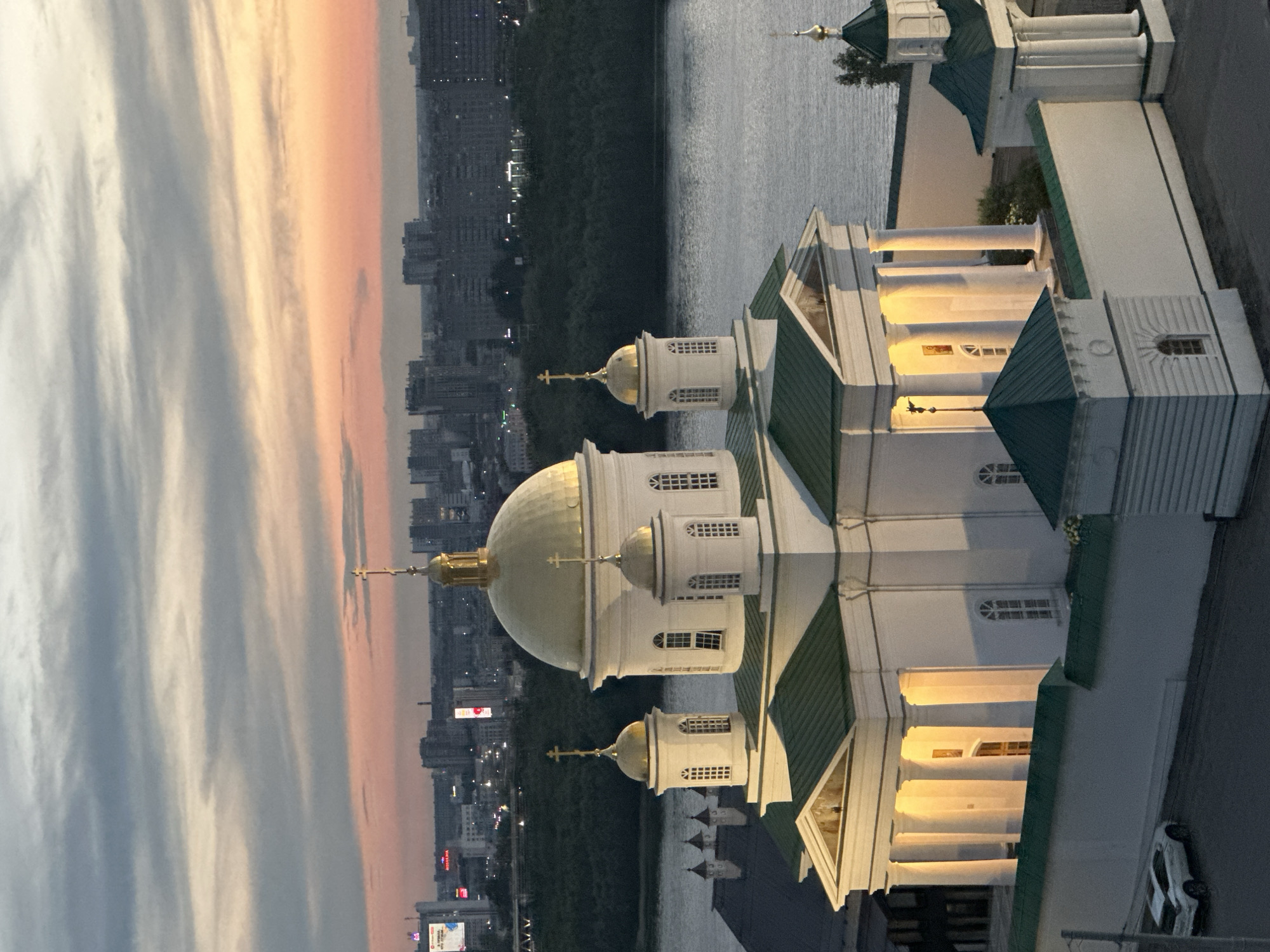 Golden-domed church overlooks river and Nizhny Novgorod skyline