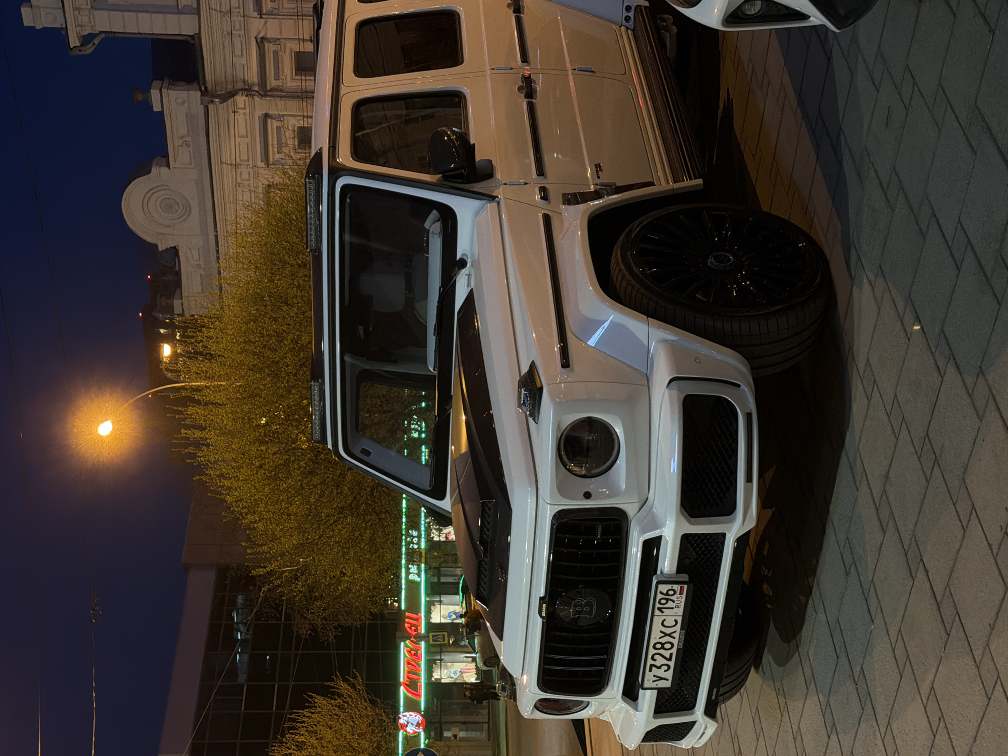 Luxury SUV spotted parked near storefront in Yekaterinburg