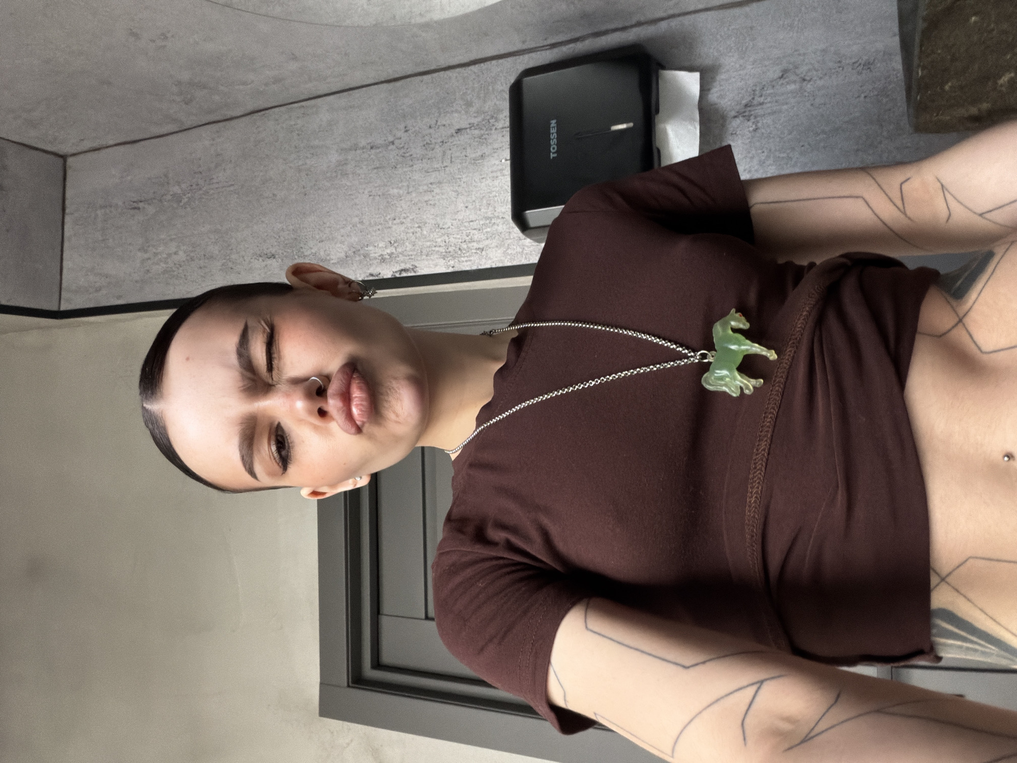 Person poses in Moscow bathroom setting