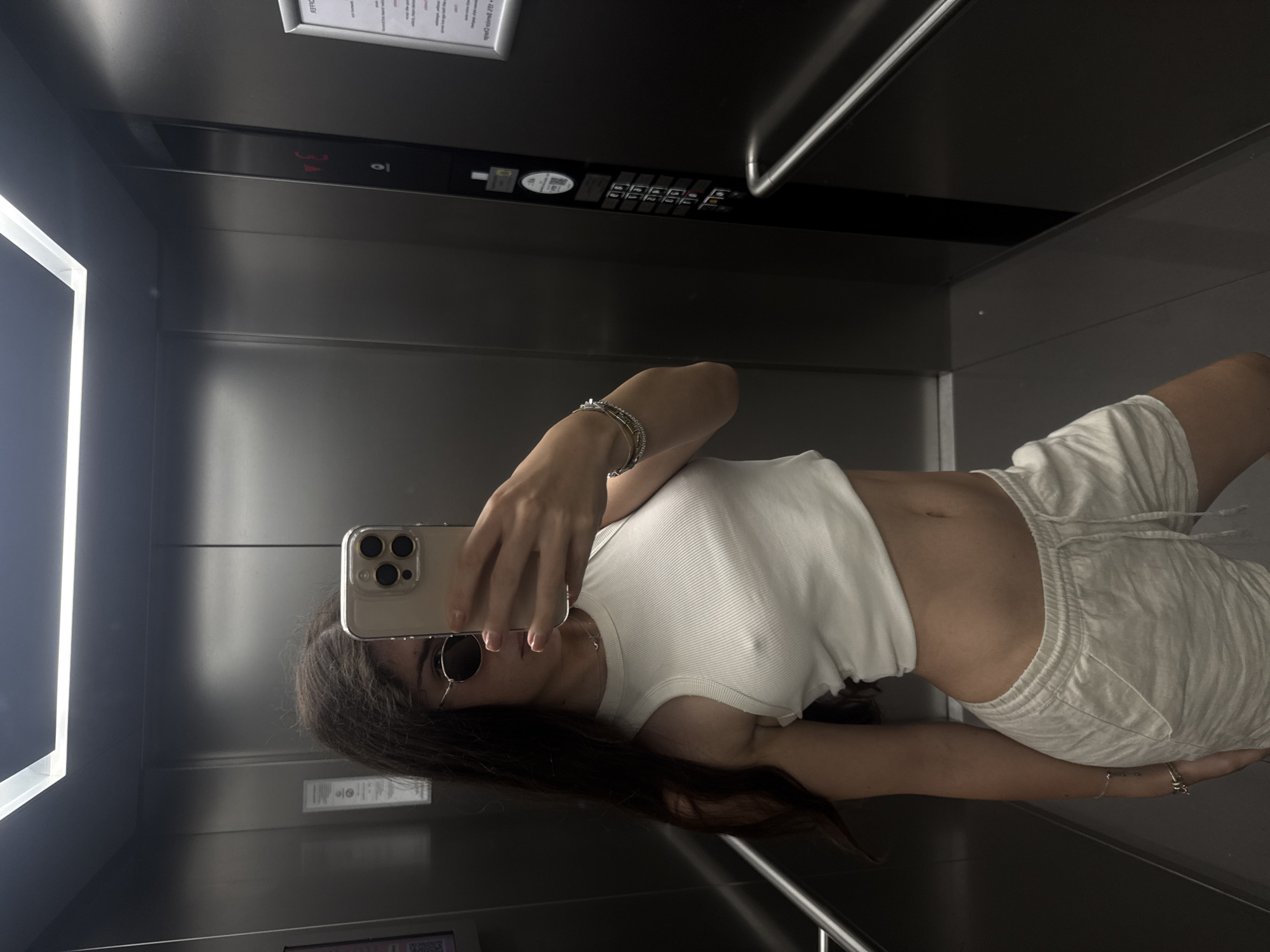 Mirror selfie in a sleek Budapest elevator