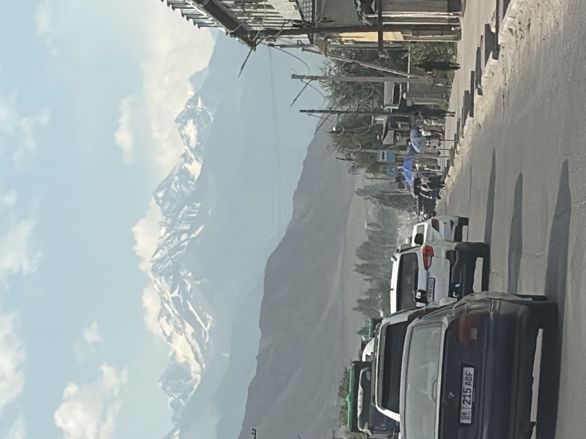 Road trip through a mountain city, mid-June 2026