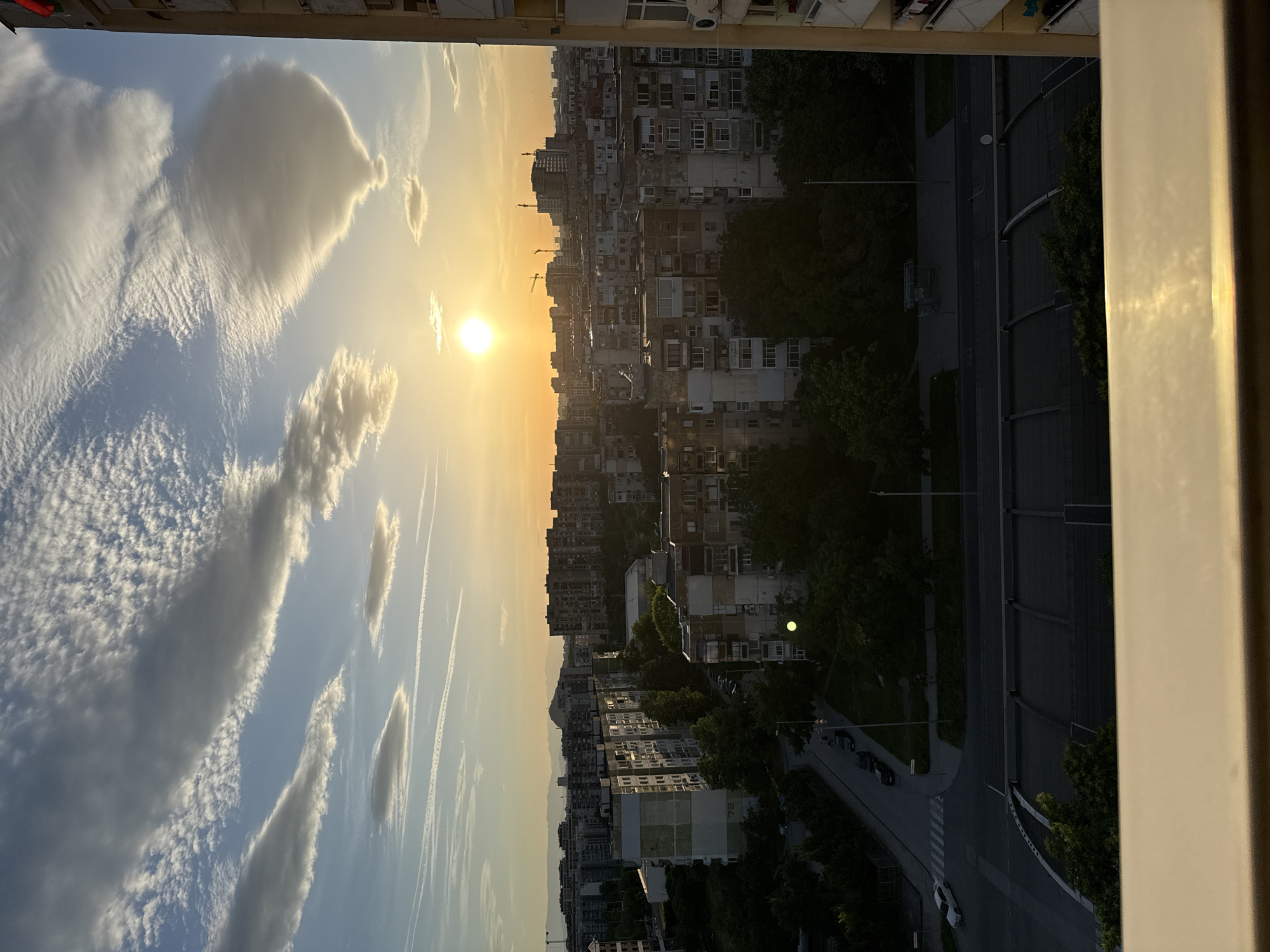 Evening moments captured: sunset views and indoor streaming activities
