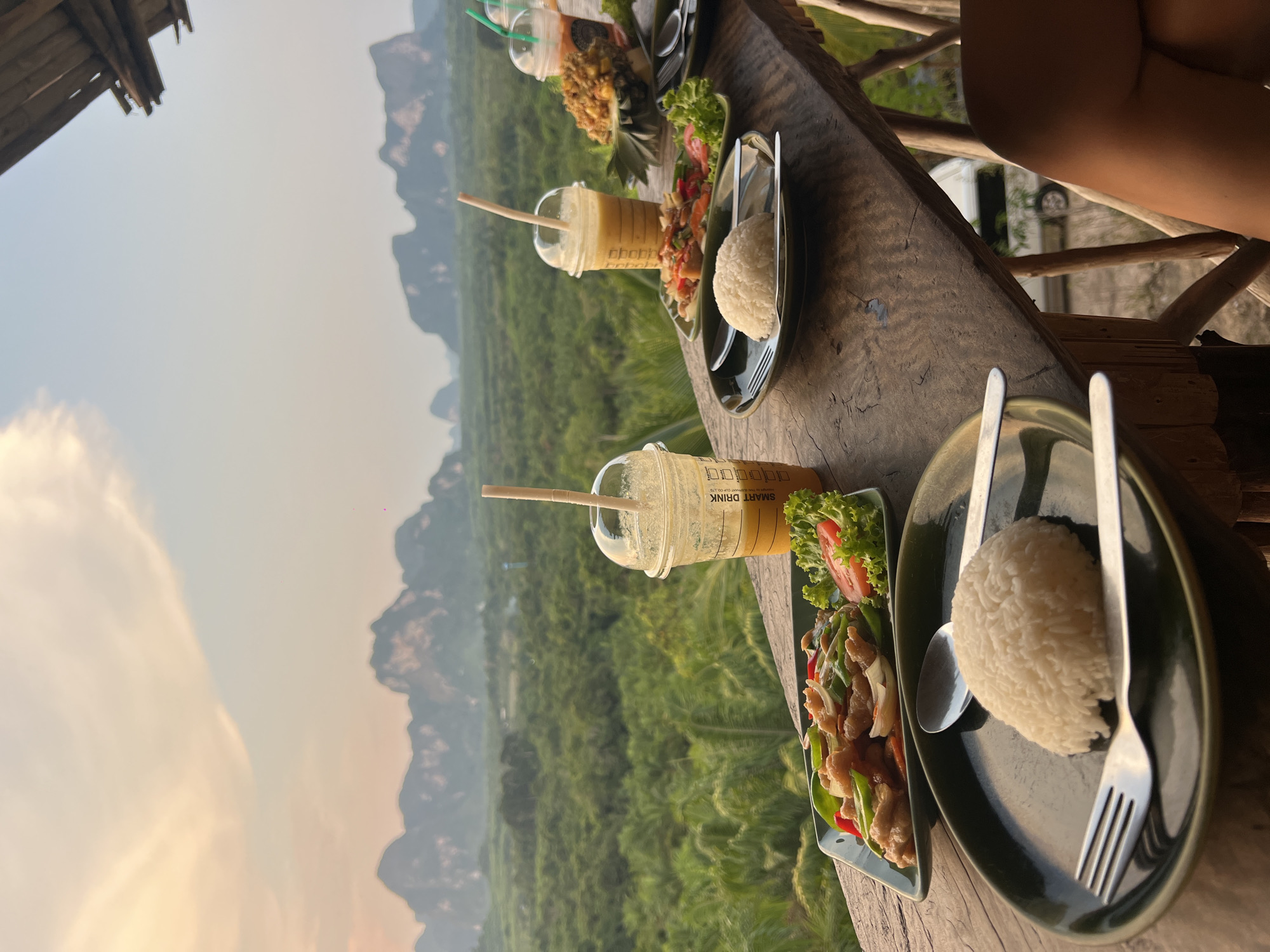 Two visitors enjoy scenic overlook at Khao Thong, Thailand