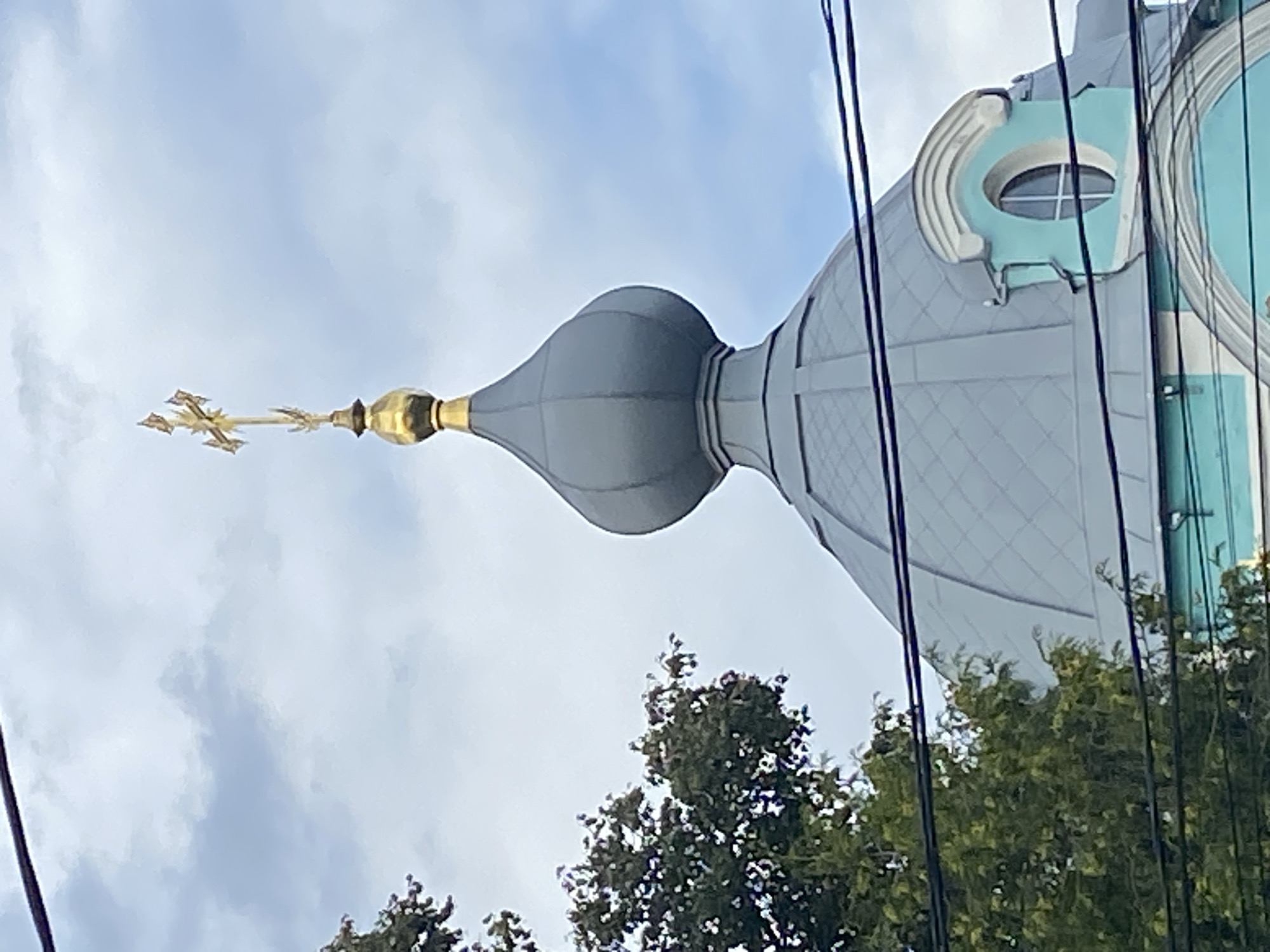 Close-up details of a Russian Orthodox church dome and bell tower