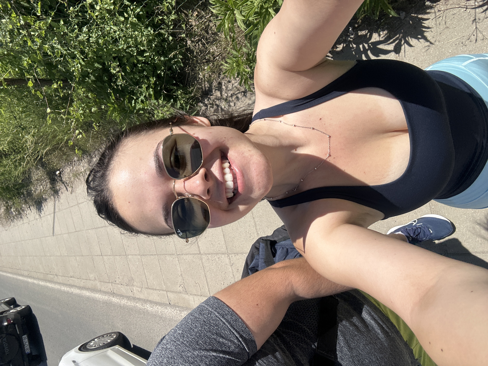 Couple takes selfies on Sofia street near medical building