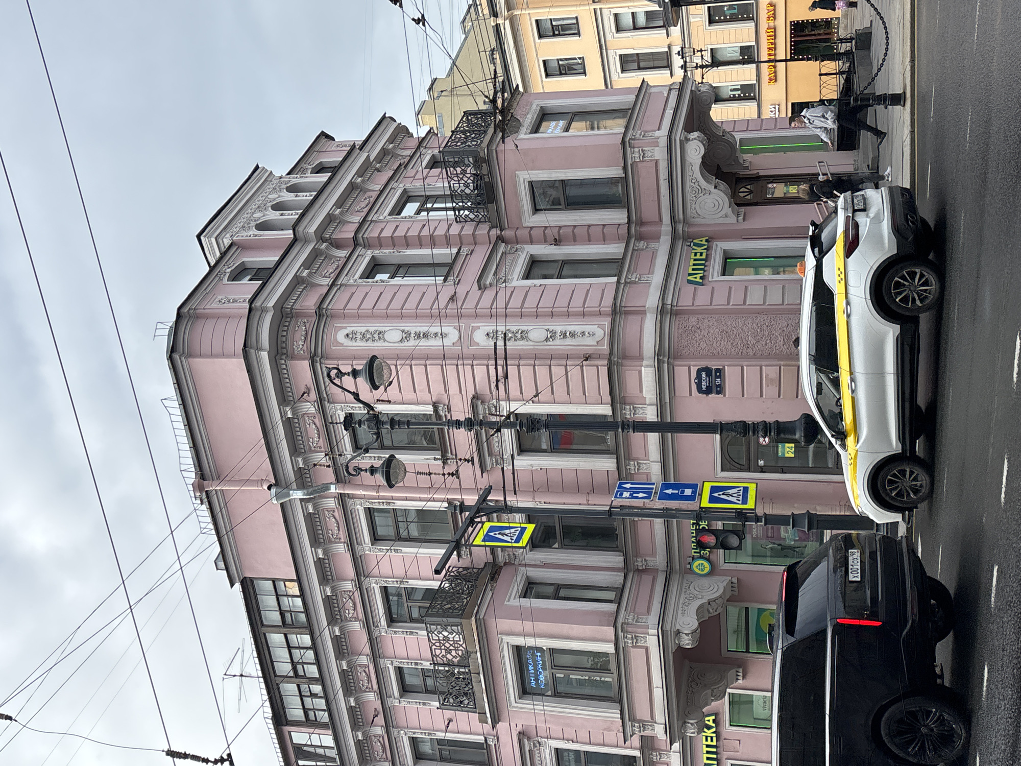 Tourist documents Saint Petersburg landmarks and flag-decorated streets