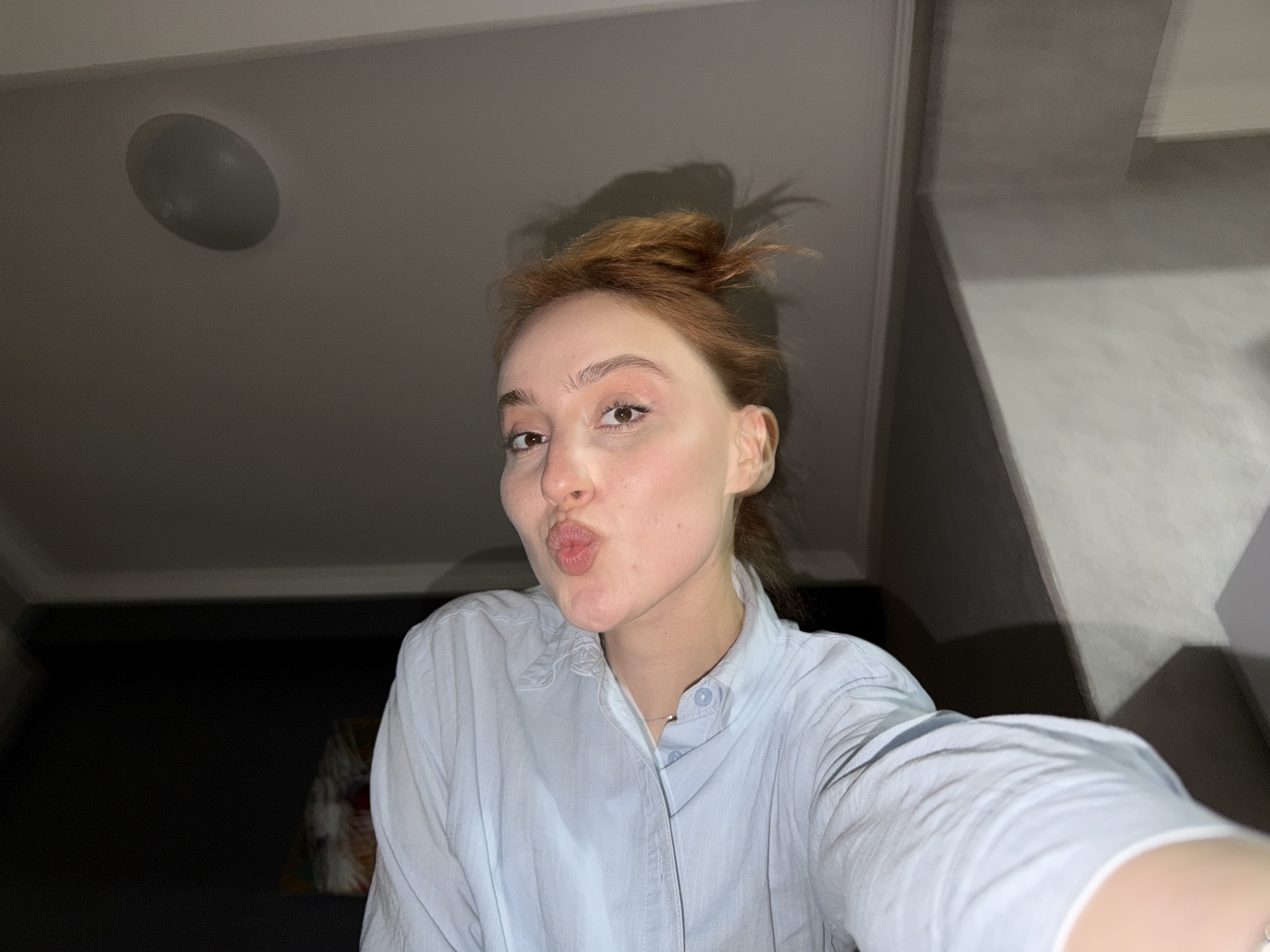 Woman takes selfie series in Tbilisi apartment