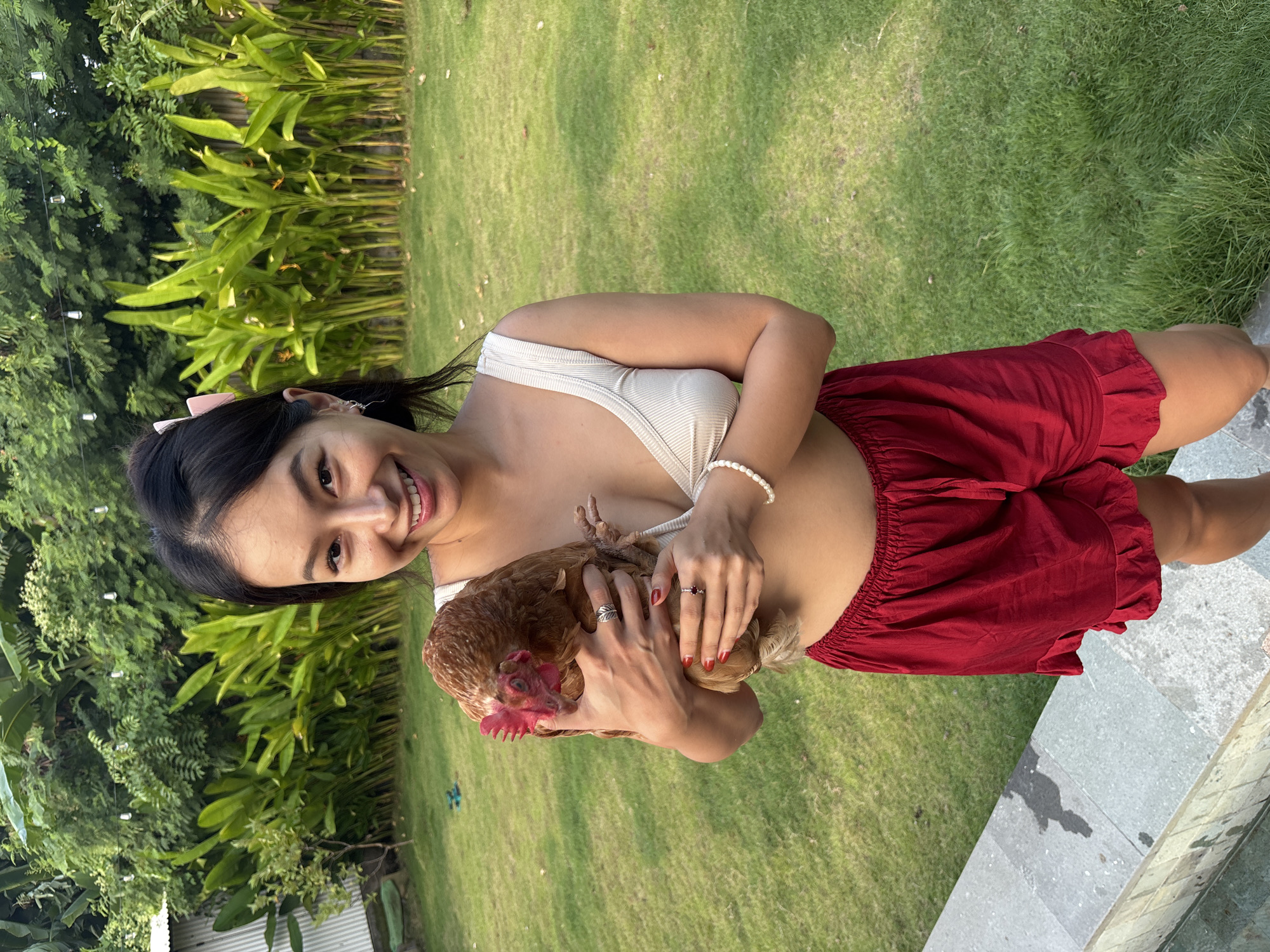 Lazy morning at a Bali villa with chickens, pool, and food