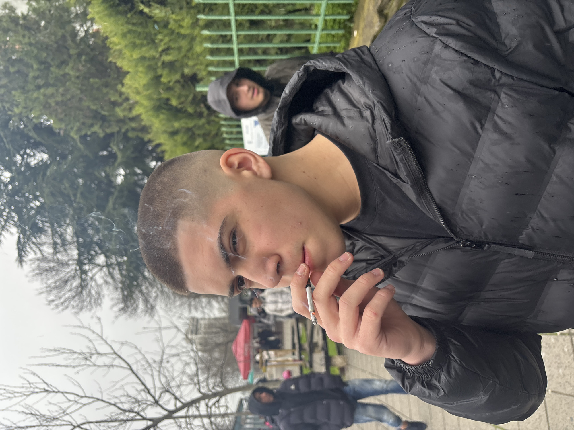 Young man smoking cigarette in Burgas, Bulgaria