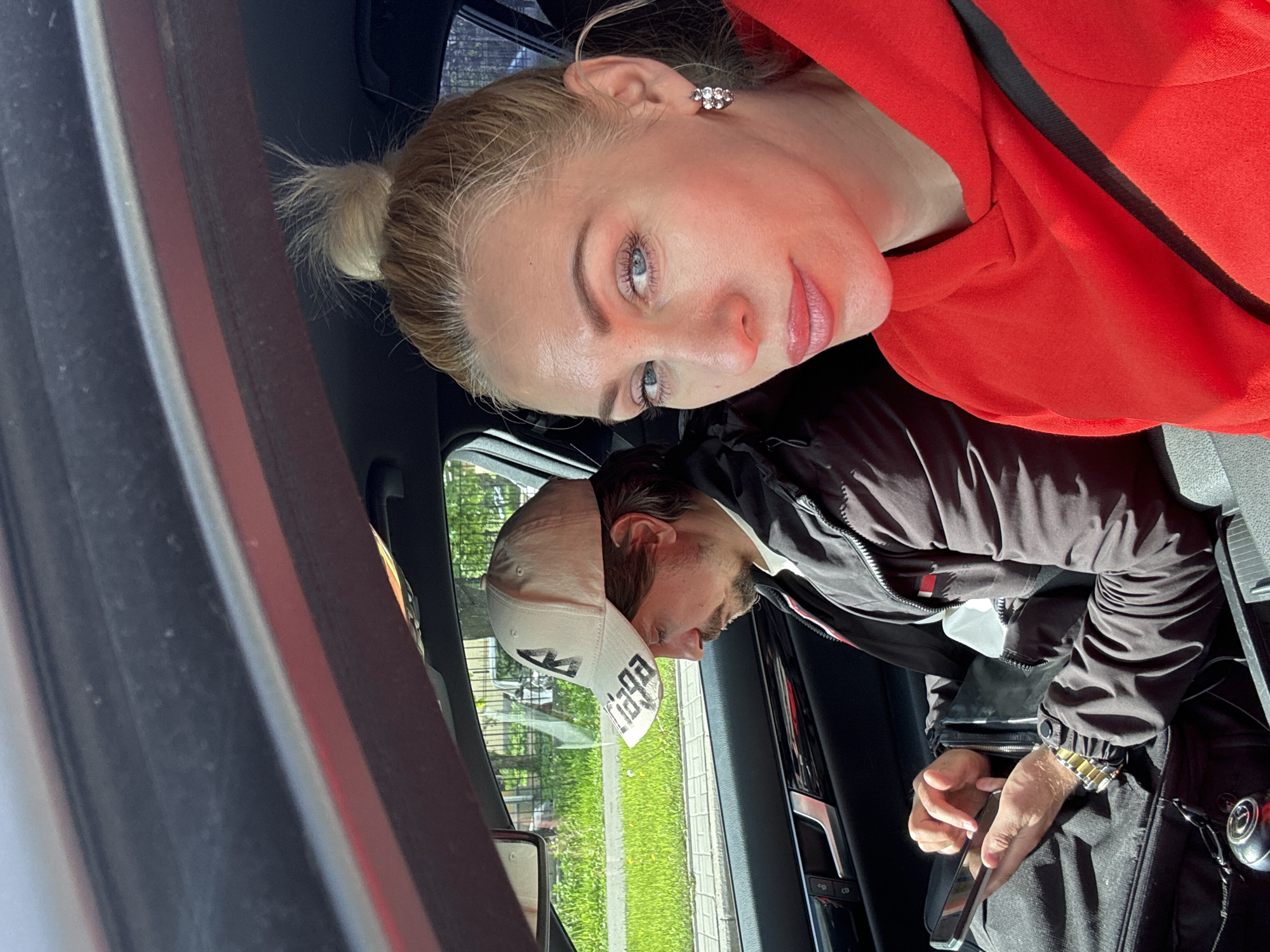 Woman in red hoodie documents daily errands across city