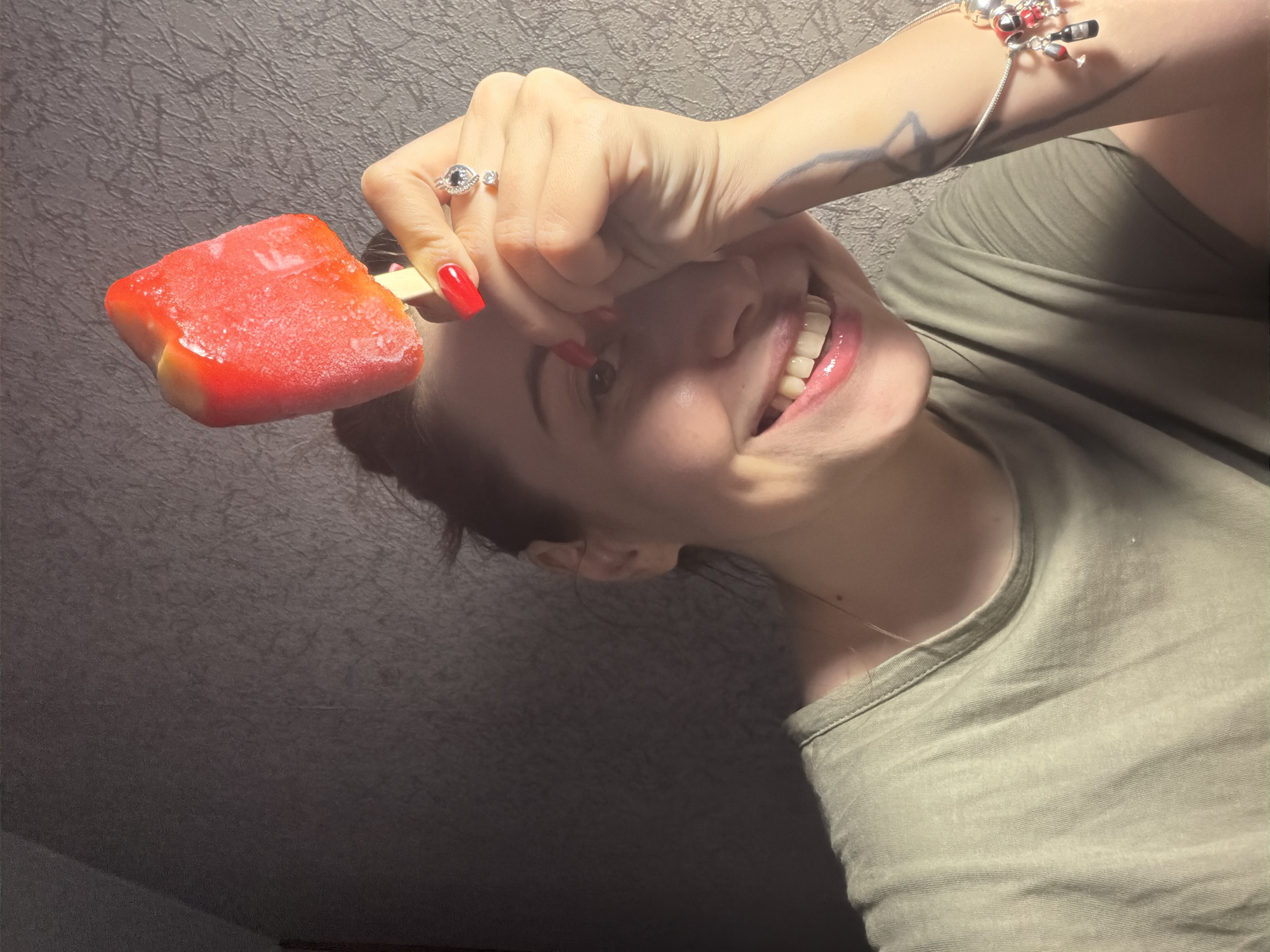 Couch time with a chihuahua and a red popsicle