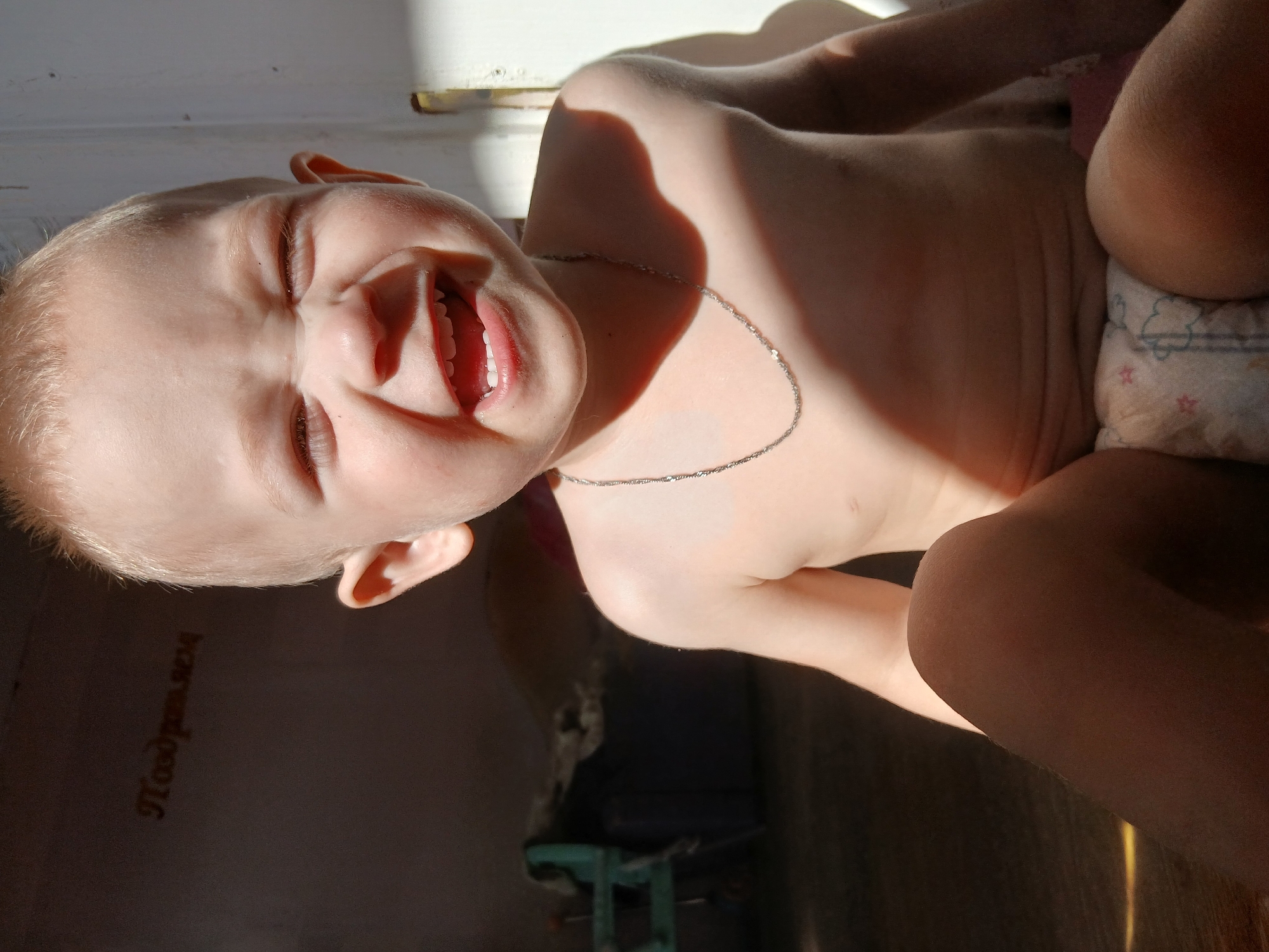 Home life in Chaikovsky: a toddler, a cat, and selfies