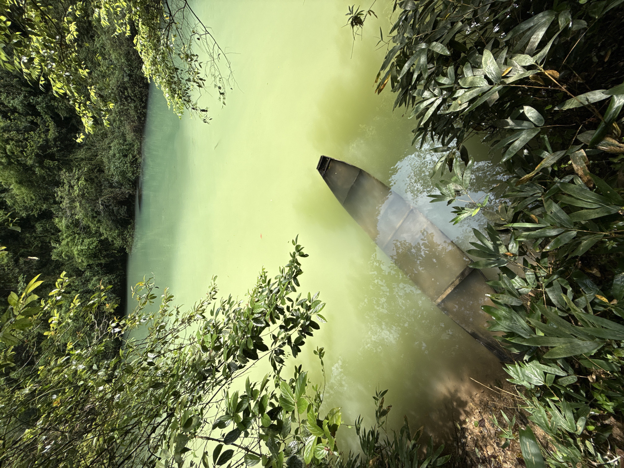 Partially submerged boat spotted in Zhangjiajie canal