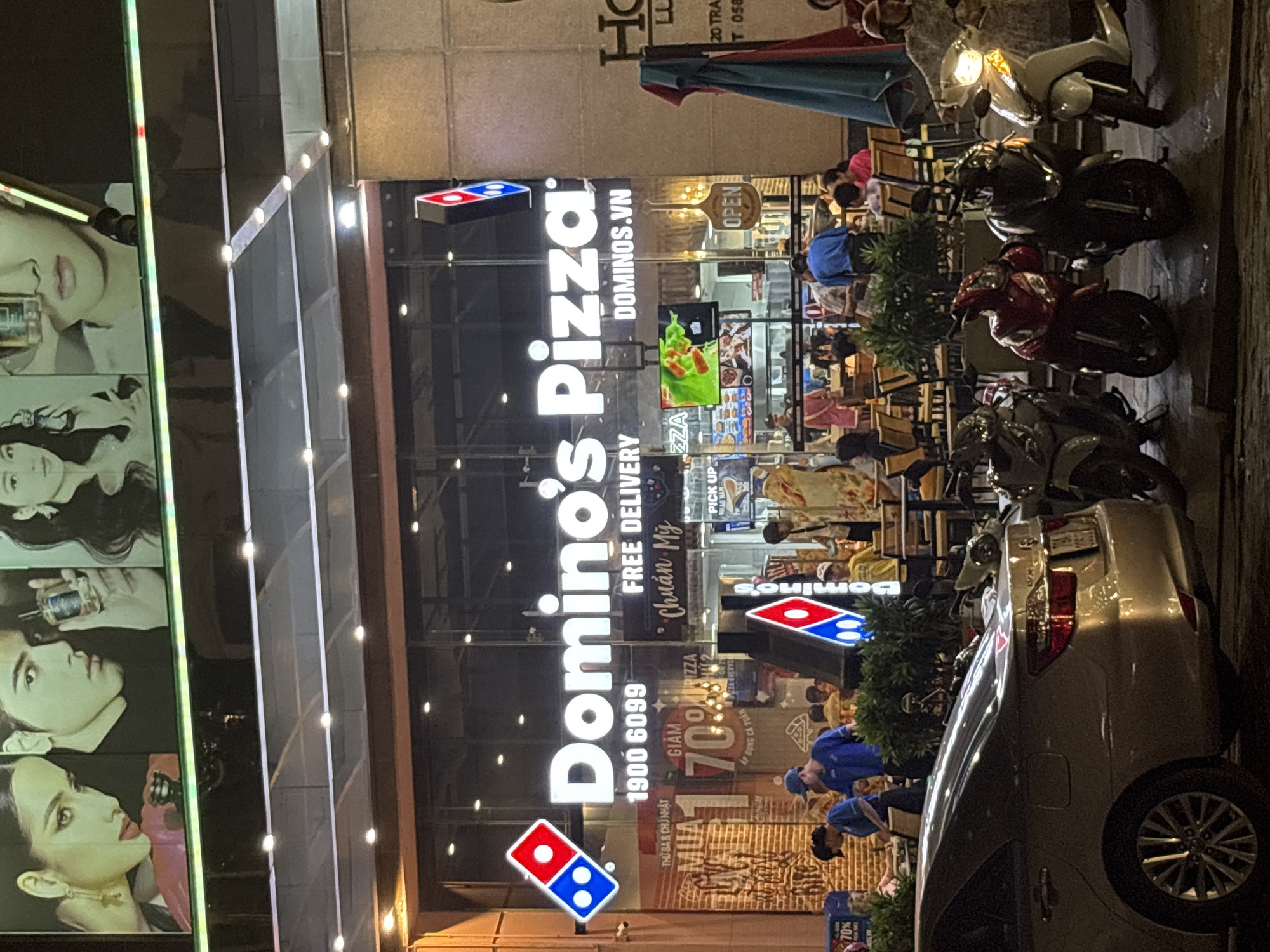 Nighttime commercial district activity captured in Nha Trang Ward