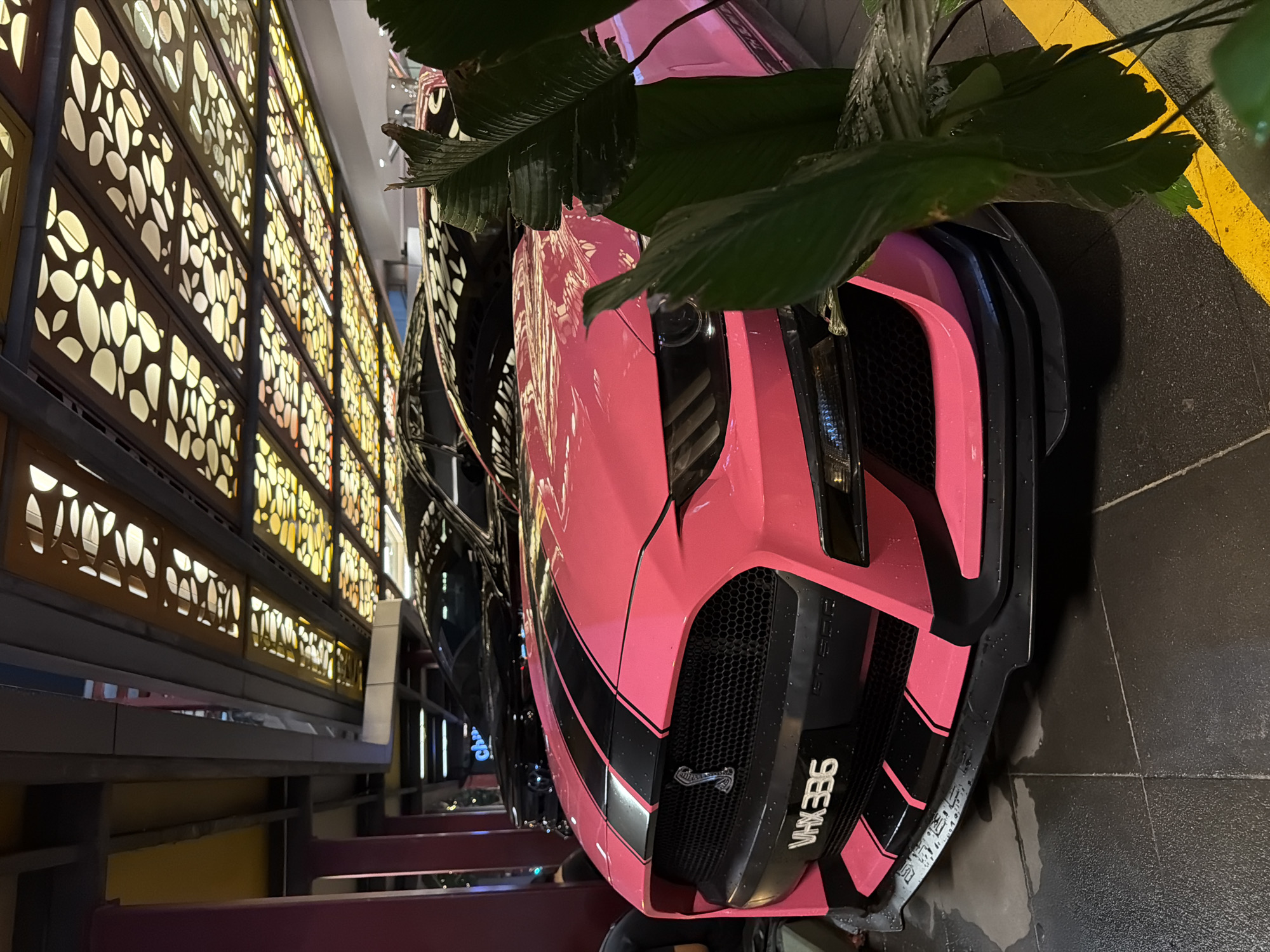 Pink Mustang GT500 parked at Kuala Lumpur mall entrance