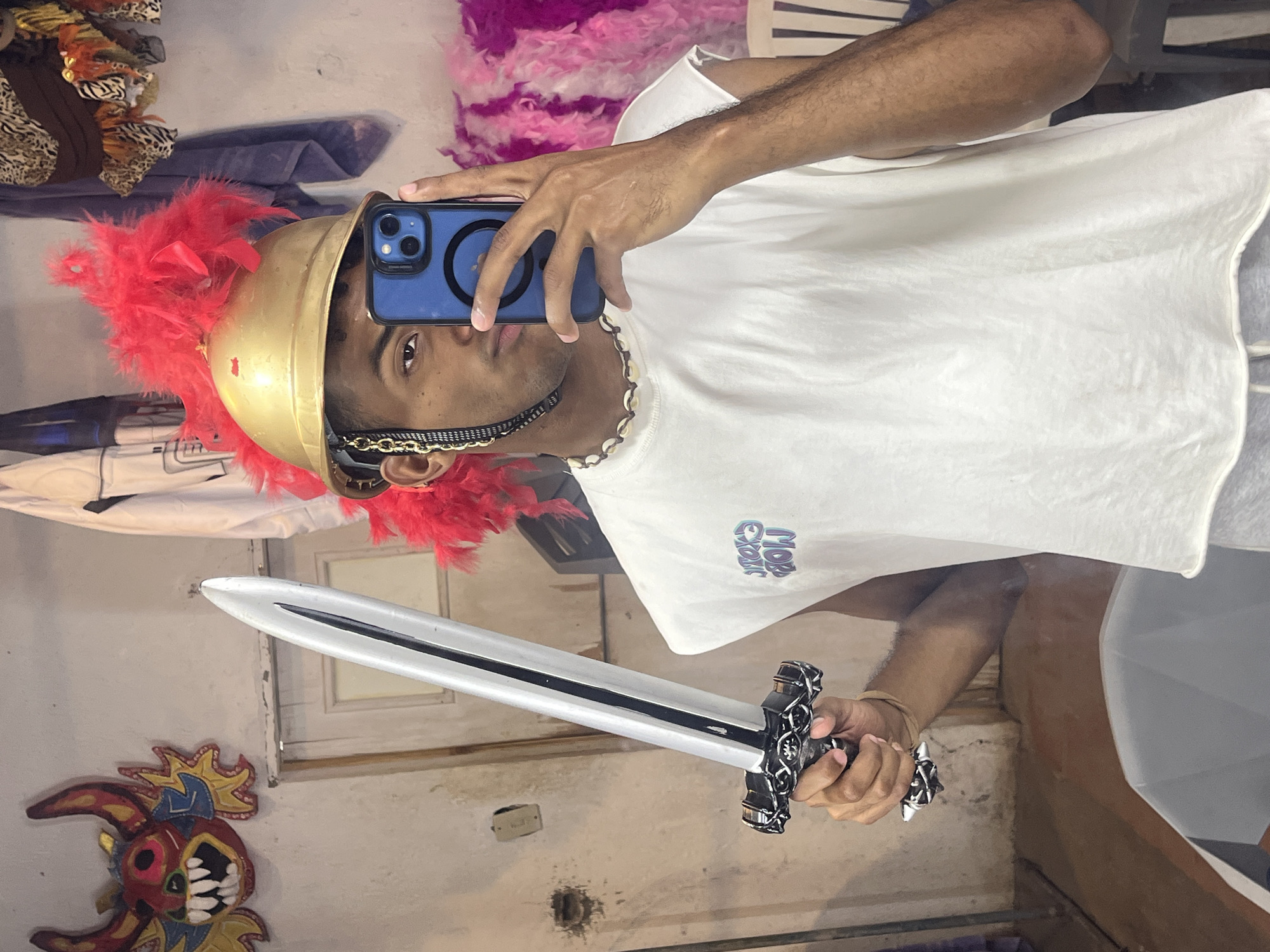 Person in Roman costume takes selfie in Porlamar