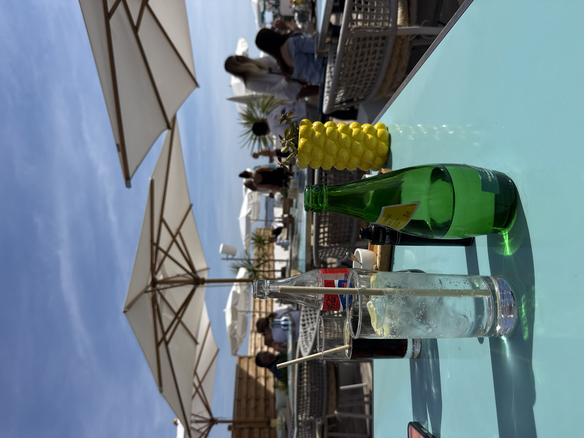 Outdoor dining scene captured at upscale Cannes café