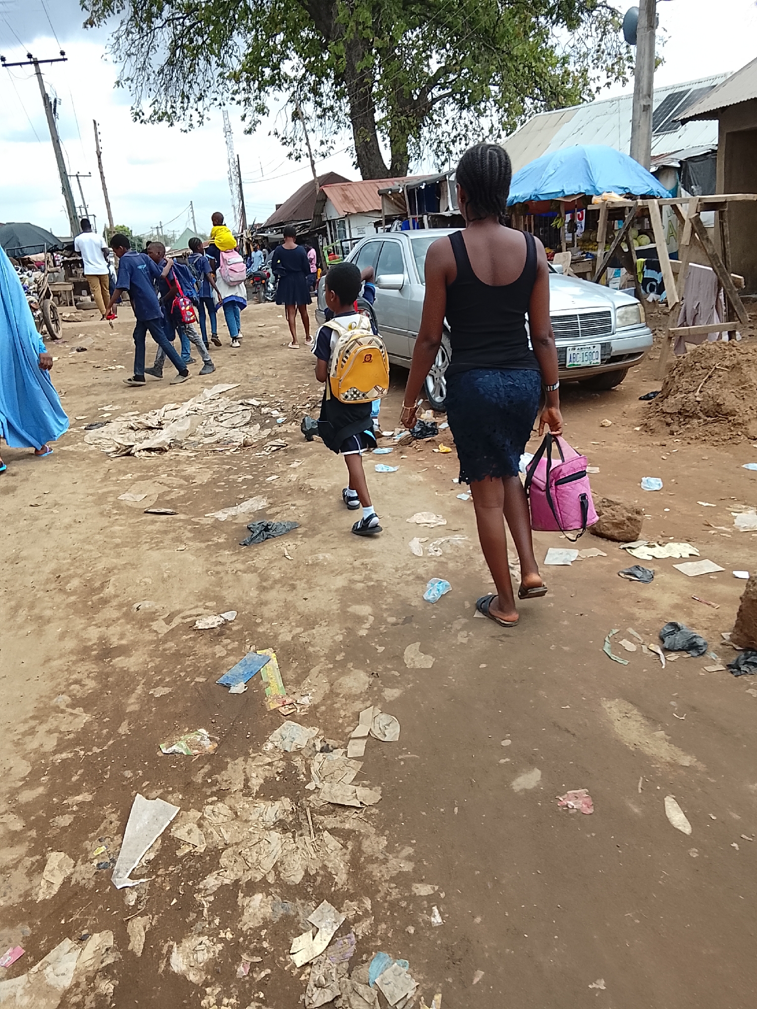 Daily life scenes captured across Abuja neighborhoods and schools