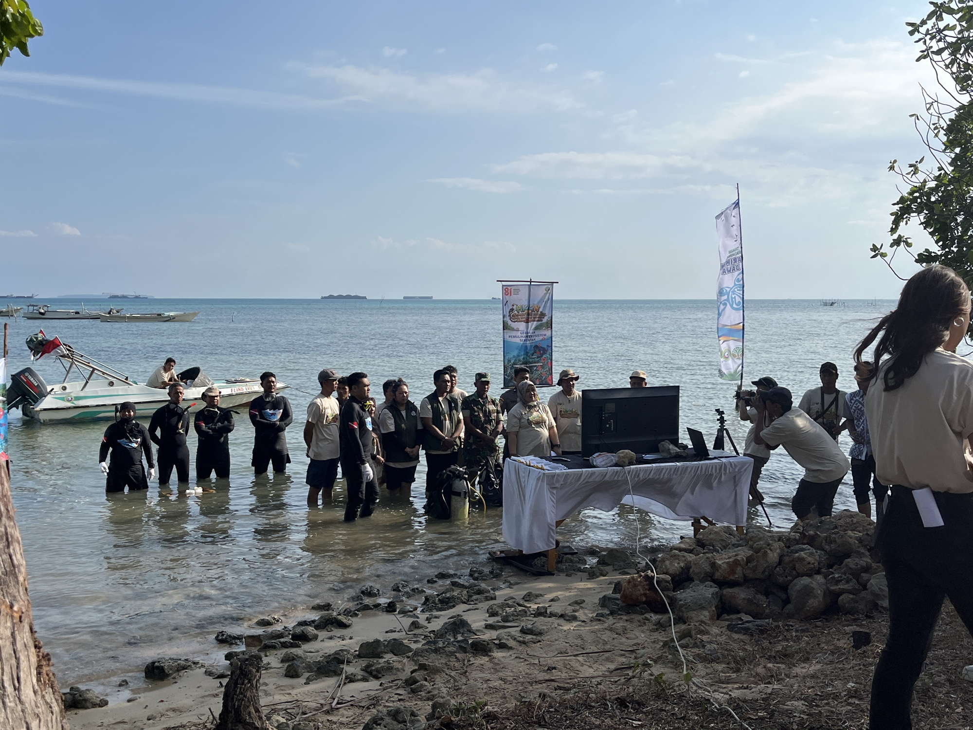 Outdoor event and shoreline gathering in Kemloko, Indonesia