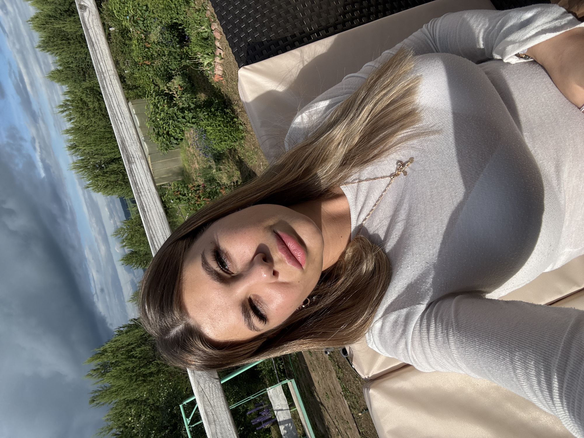Outdoor selfies captured in rural Russian village setting