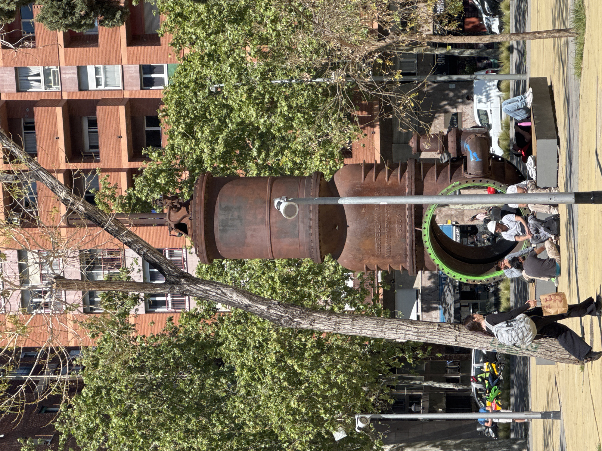 Barcelona residents enjoy recreational space near repurposed industrial art